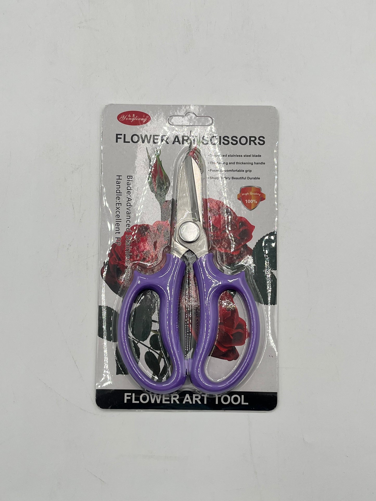 6.5" flower art scissors with stainless steel blades & ergonomic handle in purple. Sold for $7.99 retail by floralsuppliespoint1.com.