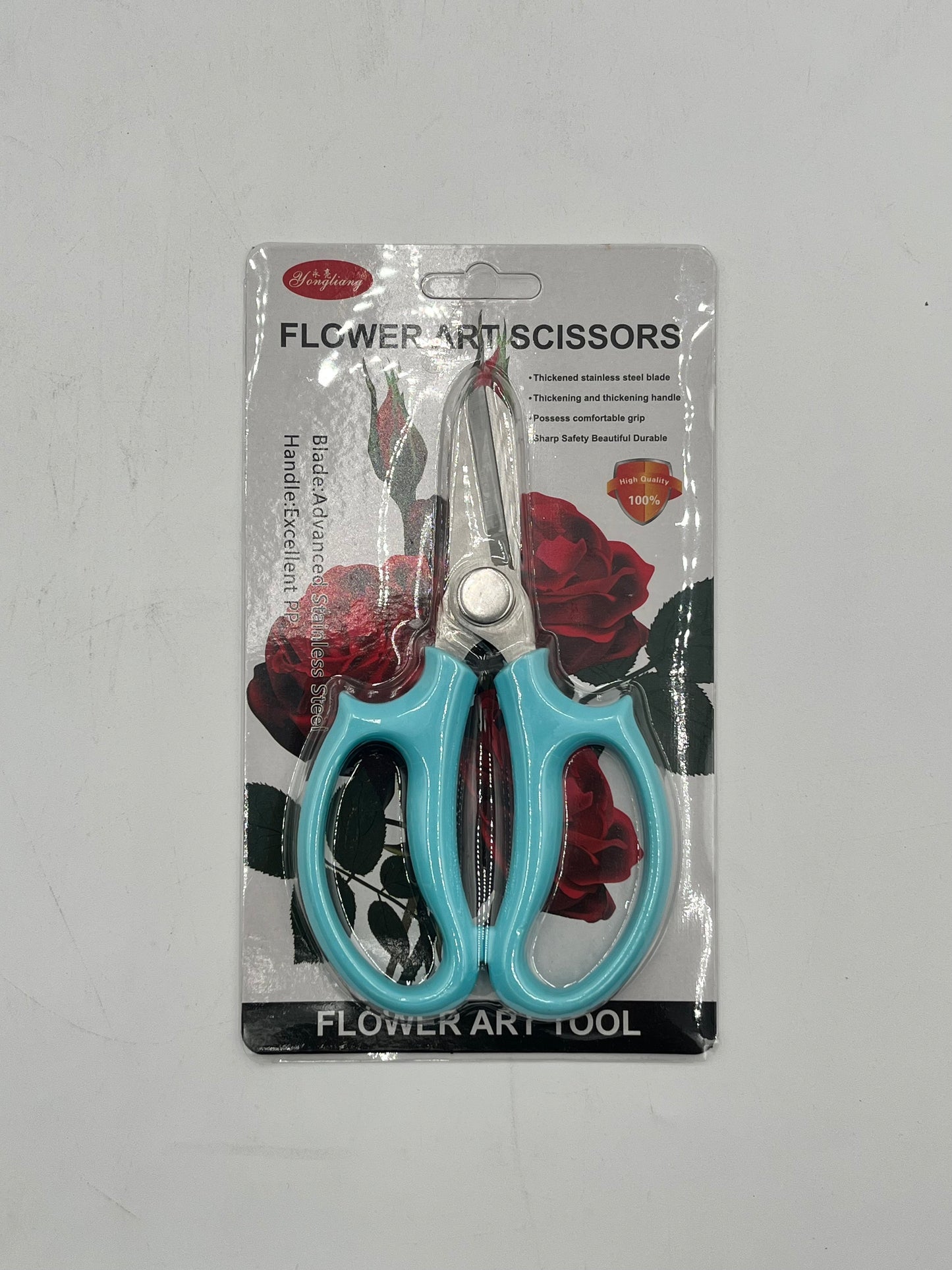 6.5" flower art scissors with stainless steel blades & ergonomic handle in teal. Sold for $7.99 retail by floralsuppliespoint1.com.