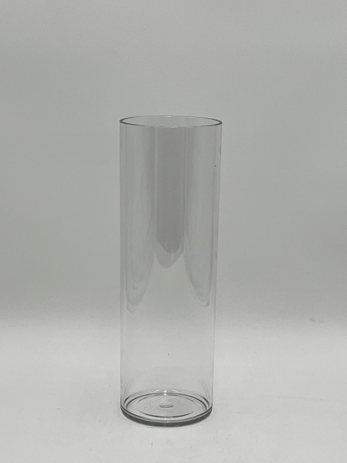 Clear plastic cylinder vases in four sizes for floral design, candles, or decor use. Lightweight and modern. Sold individually by floralsuppliespoint1.com.