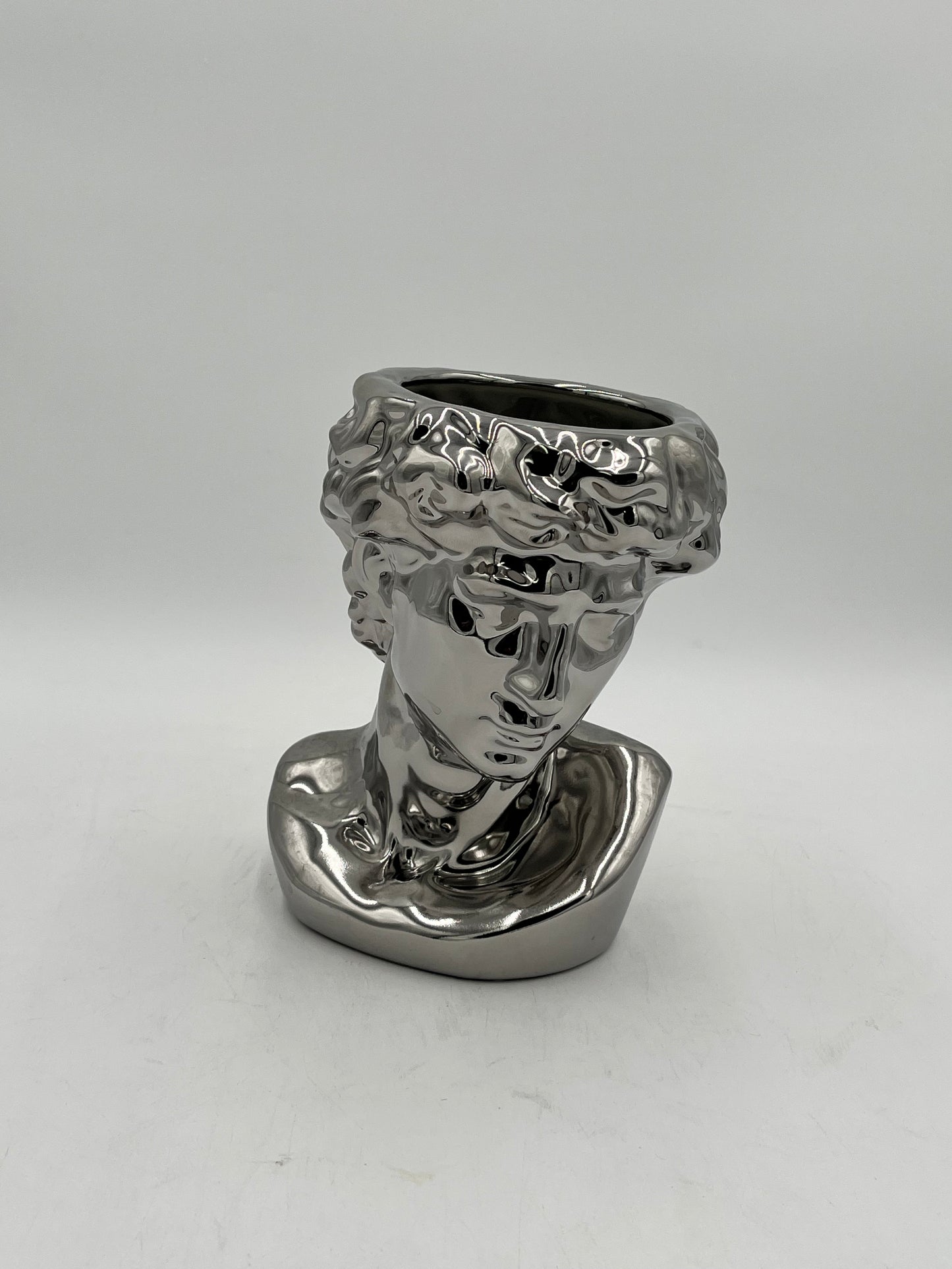 Silver ceramic bust vase with reflective finish, titled Apollo Gaze — modern artistic décor sold by floralsuppliespoint1.com $14.99