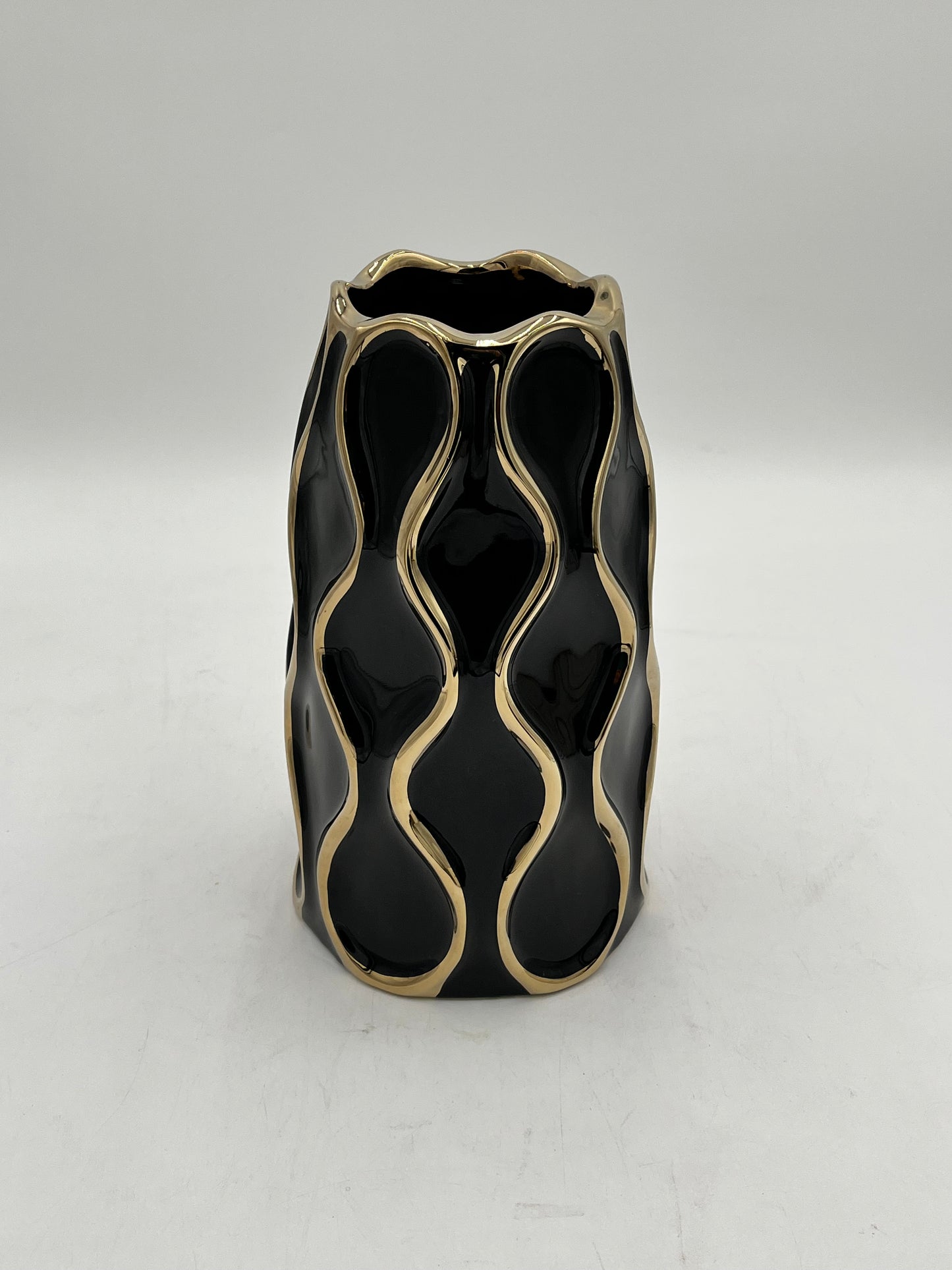 Auric Wave ceramic vases in black & white with gold wave detailing. Elegant décor accent pieces available in 5 sizes & sold by floralsuppliespoint1.com.