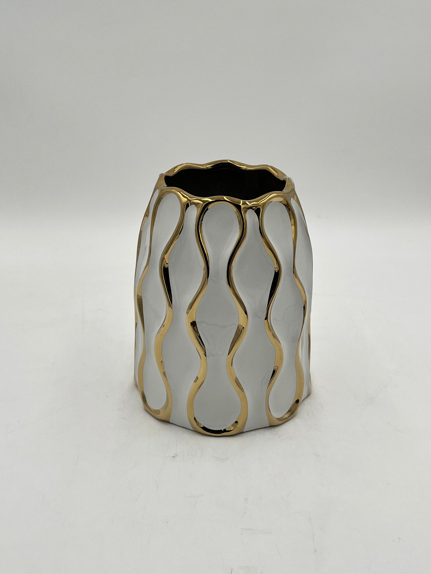 Auric Wave ceramic vases in black & white with gold wave detailing. Elegant décor accent pieces available in 5 sizes & sold by floralsuppliespoint1.com.