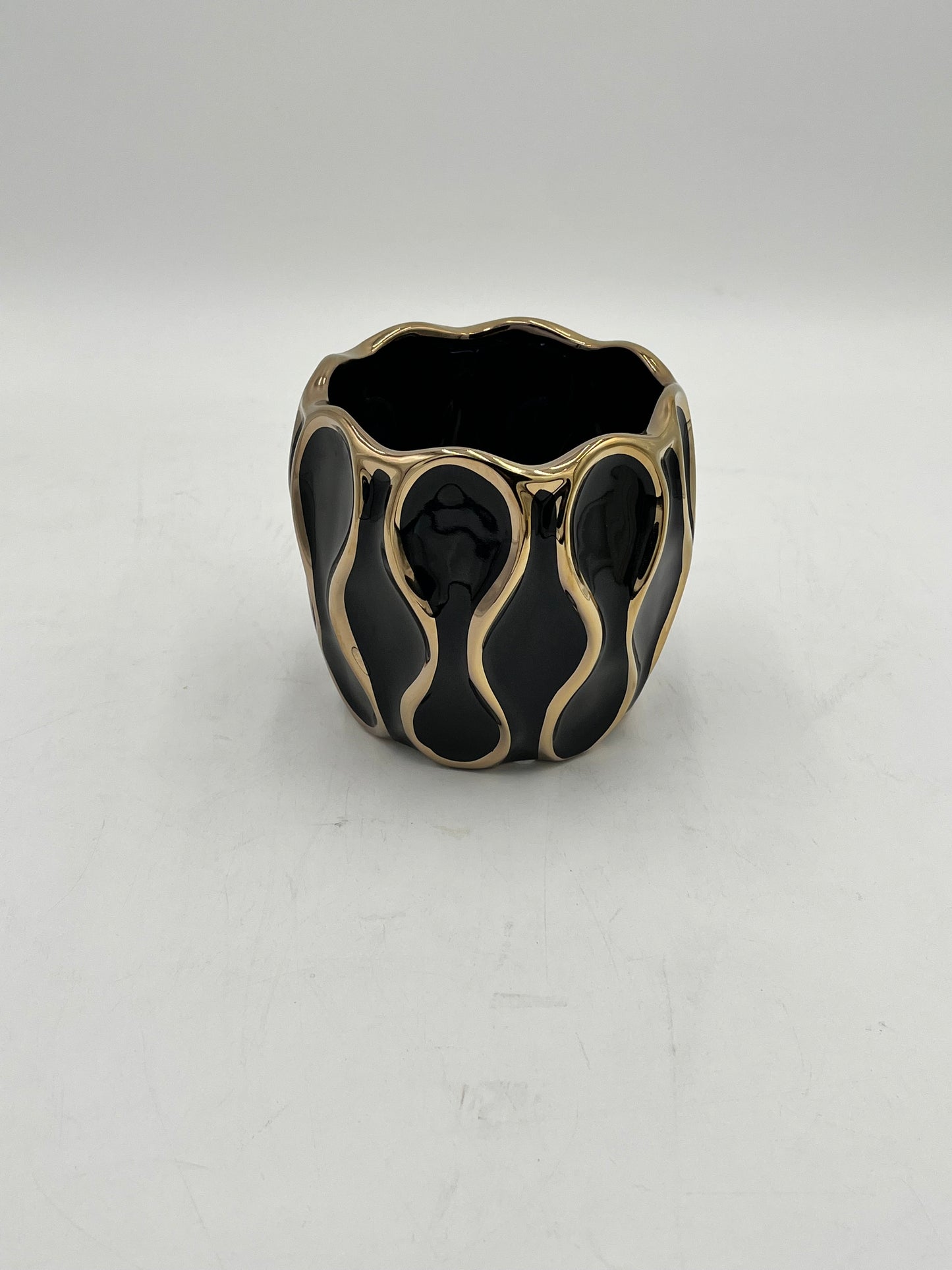 Auric Wave ceramic vases in black & white with gold wave detailing. Elegant décor accent pieces available in 5 sizes & sold by floralsuppliespoint1.com.