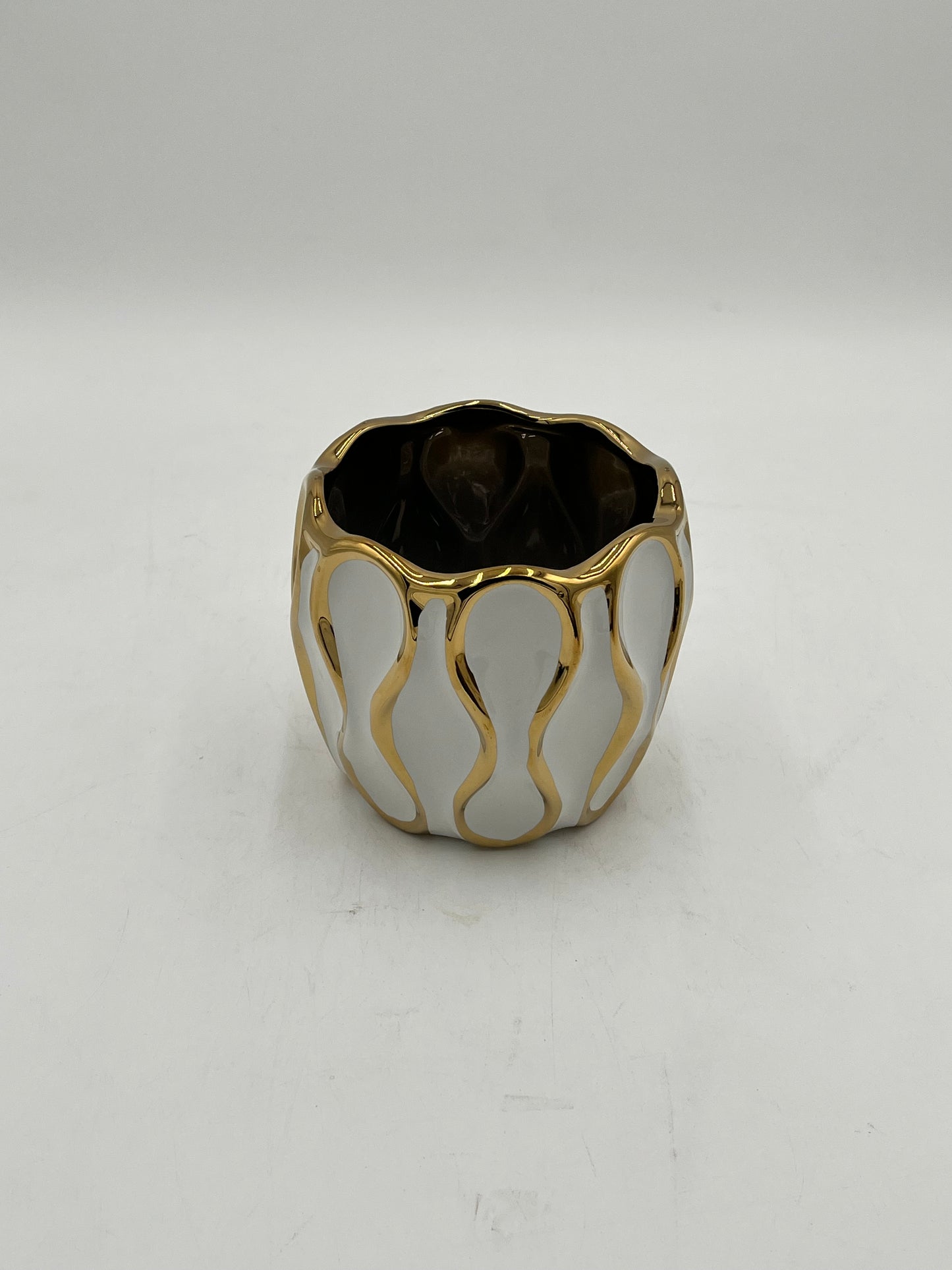 Auric Wave ceramic vases in black & white with gold wave detailing. Elegant décor accent pieces available in 5 sizes & sold by floralsuppliespoint1.com.