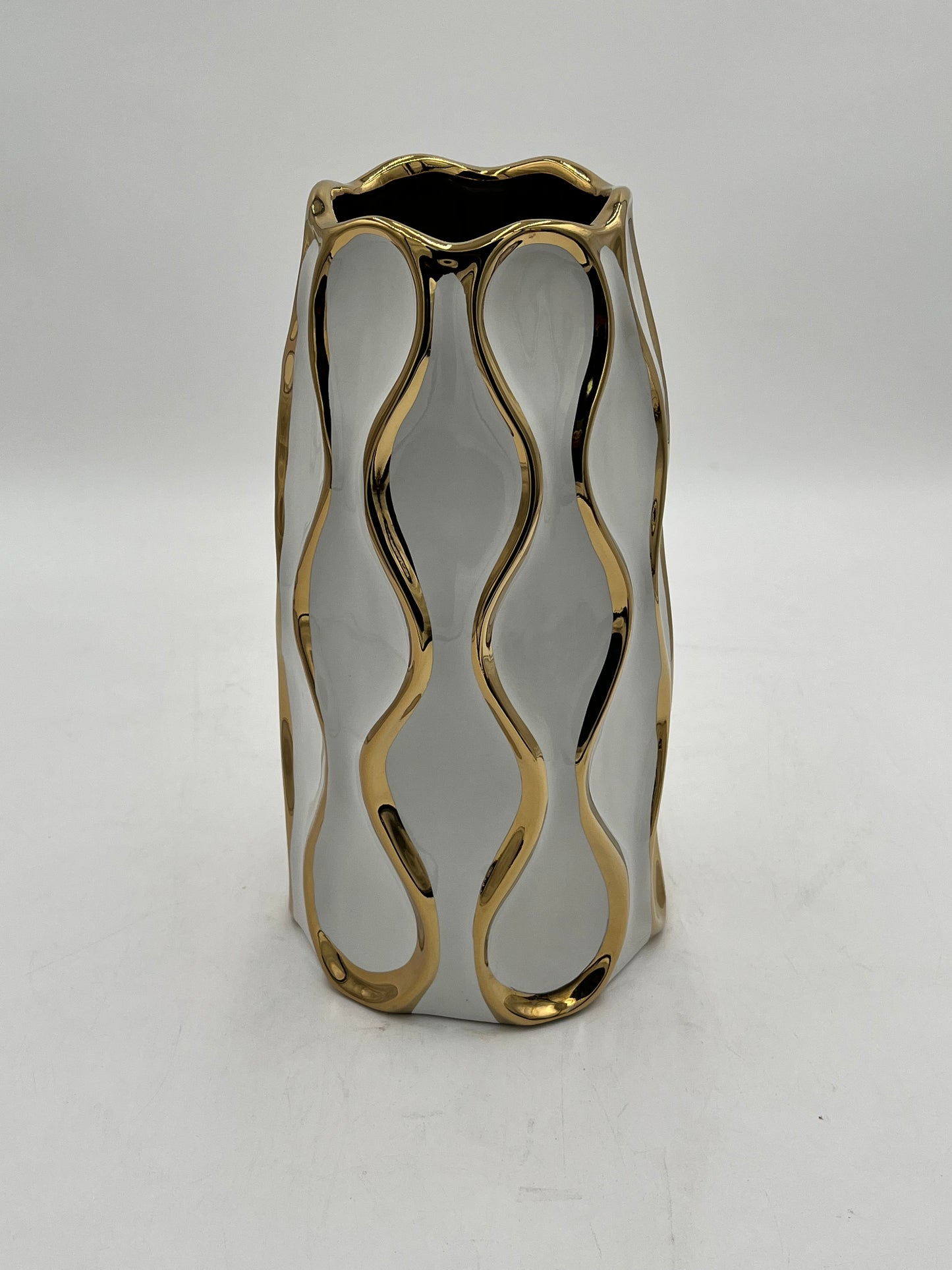 Auric Wave ceramic vases in black & white with gold wave detailing. Elegant décor accent pieces available in 5 sizes & sold by floralsuppliespoint1.com.