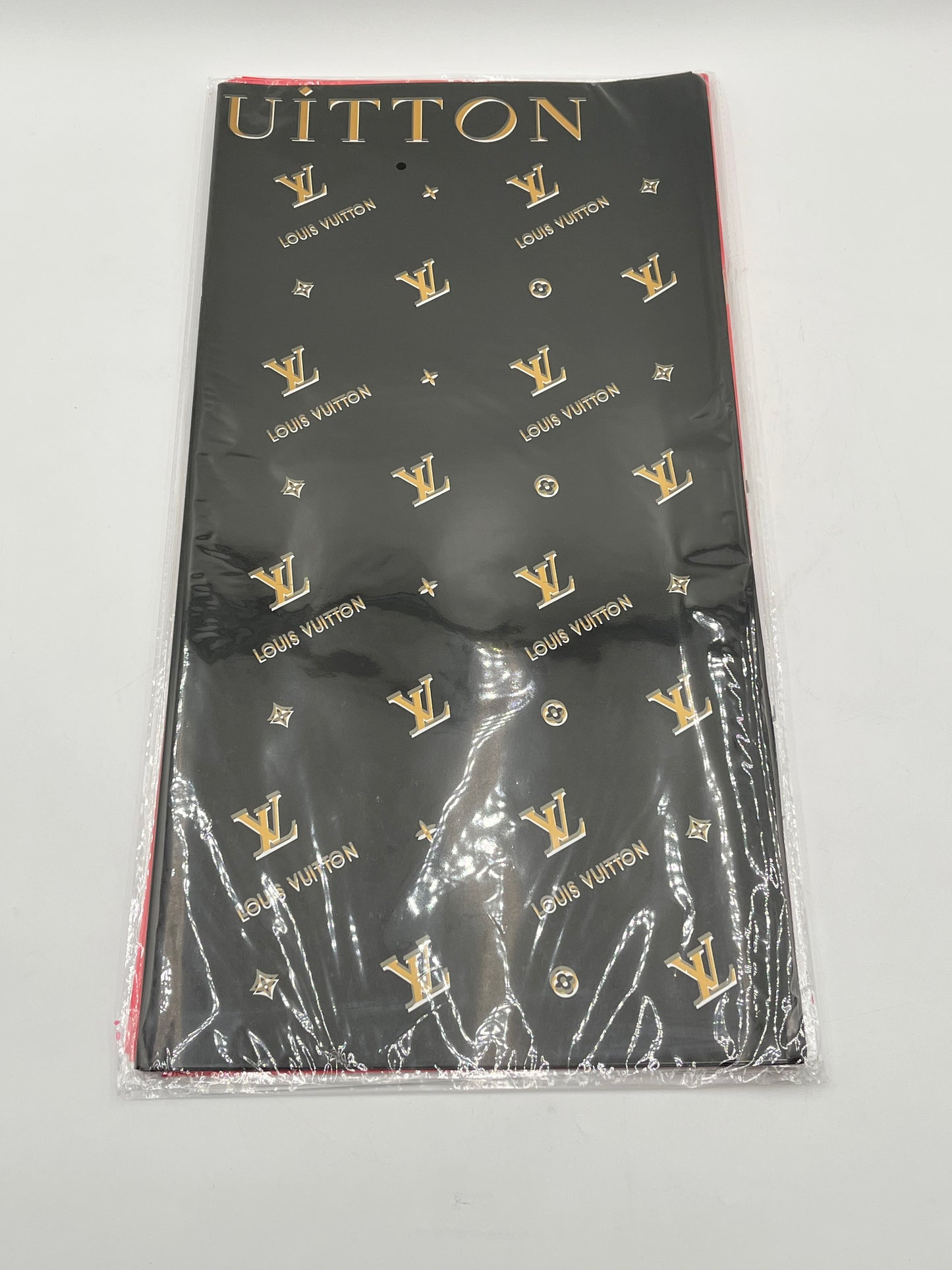 Enhance gifting with the Couture LV Collection. 20 luxury wrapping sheets (22x22) in black. $9.99 per pack, Sold by floralsuppliespoint1.com