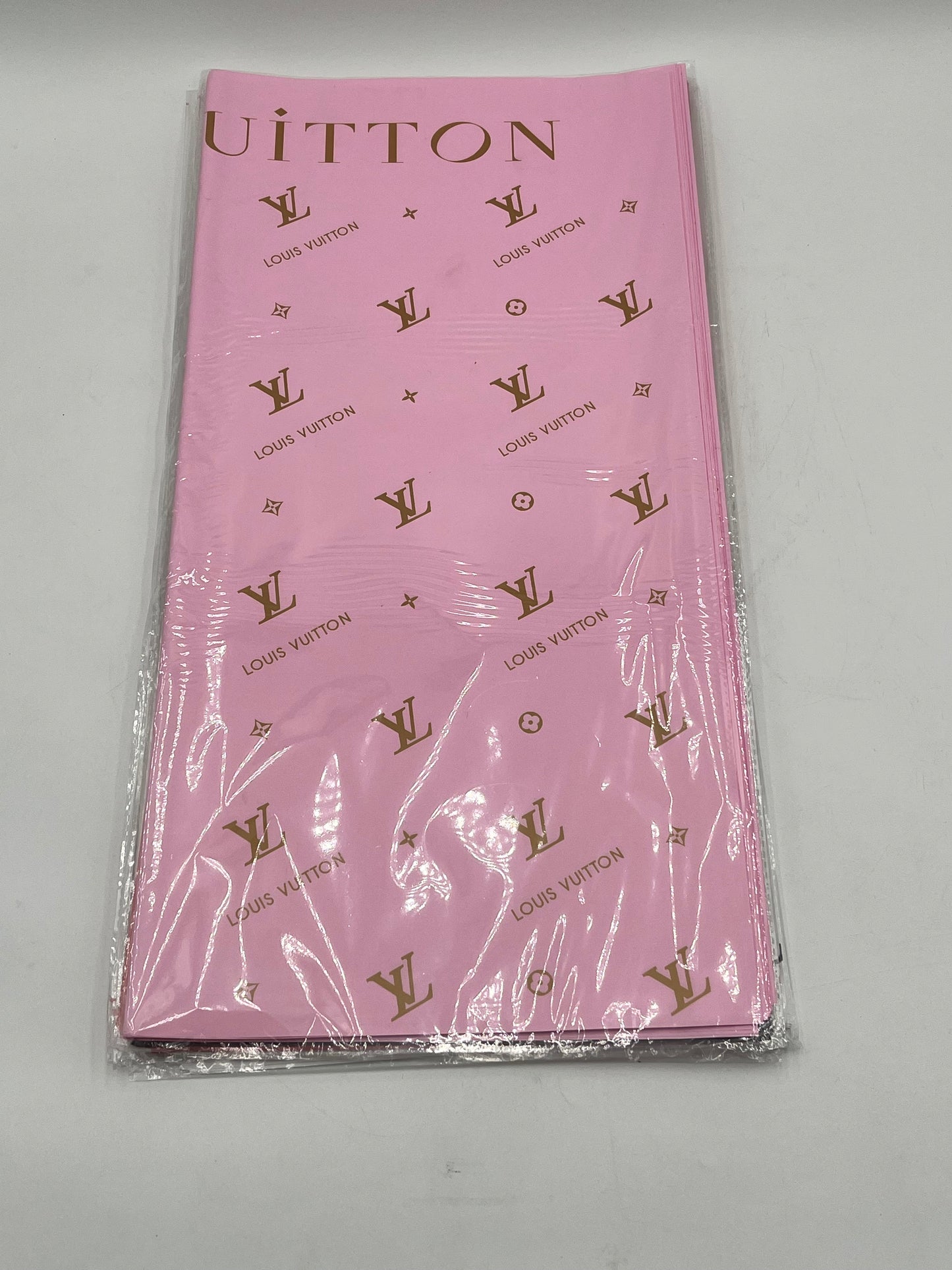 Enhance gifting with the Couture LV Collection. 20 luxury wrapping sheets (22x22) in pink. $9.99 per pack, Sold by floralsuppliespoint1.com