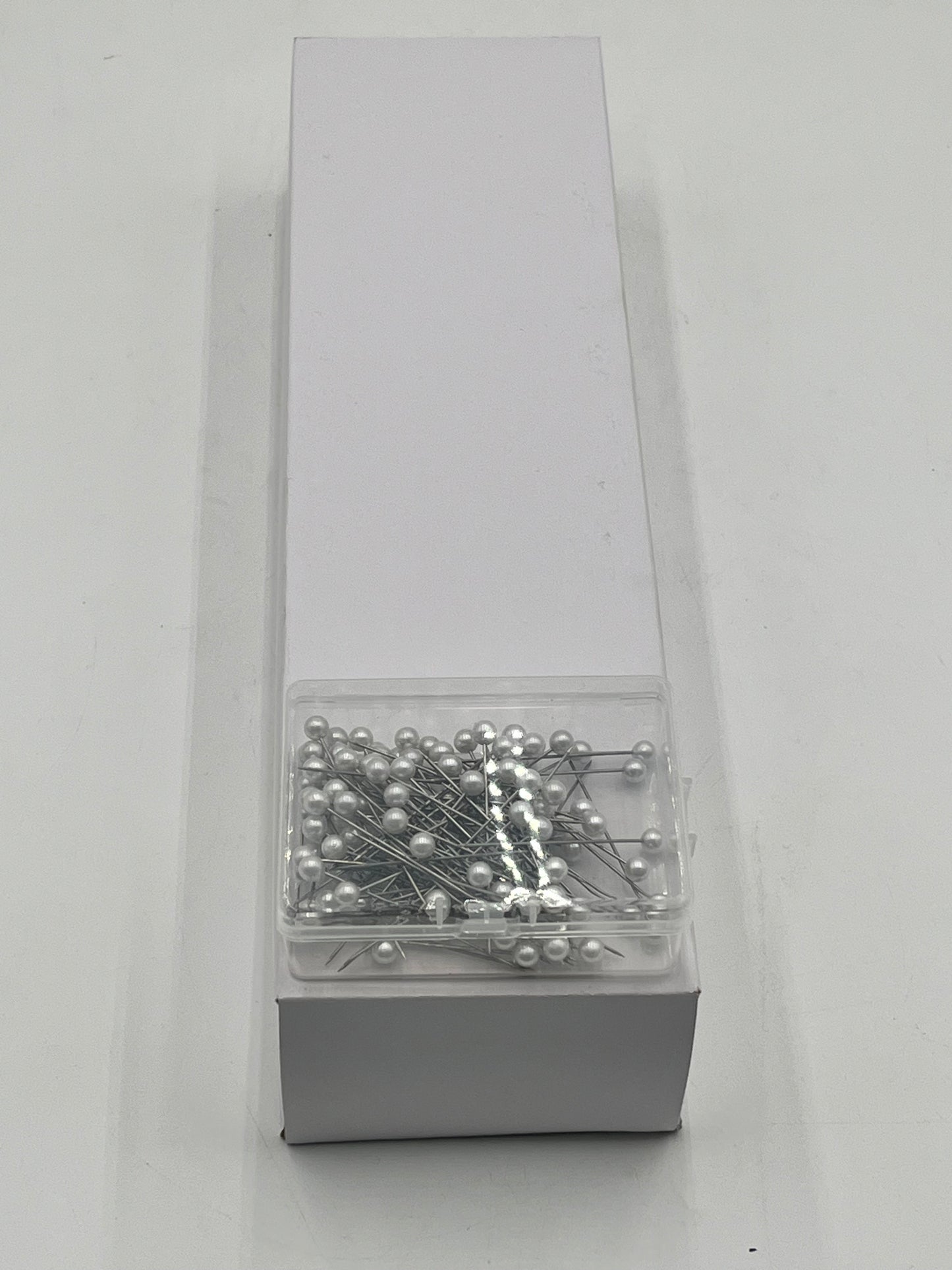 Decorative floral pins in pearl white, pink & diamond crystal styles, 50 pcs per box. Sold retail or wholesale 10-packs by floralsuppliespoint1.com