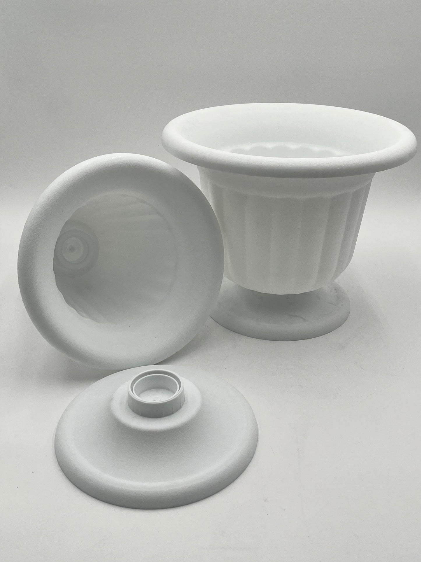 Elegant white two-piece urns in tall 11x8 and short 9x10 sizes, ideal for floral arrangements, events or memorial décor. Sold @ floralsuppliespoint1.com