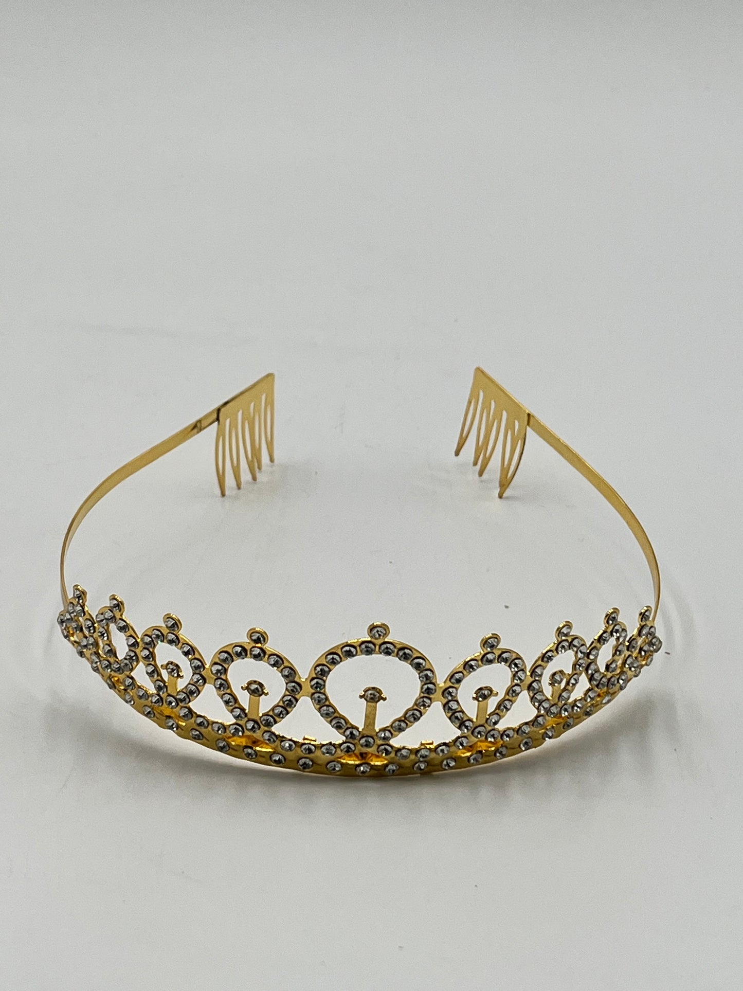 Royal Crystal Tiara Headband in gold sold retail & wholesale by floralsuppliespoint1.com. Ideal for birthdays & celebrations.