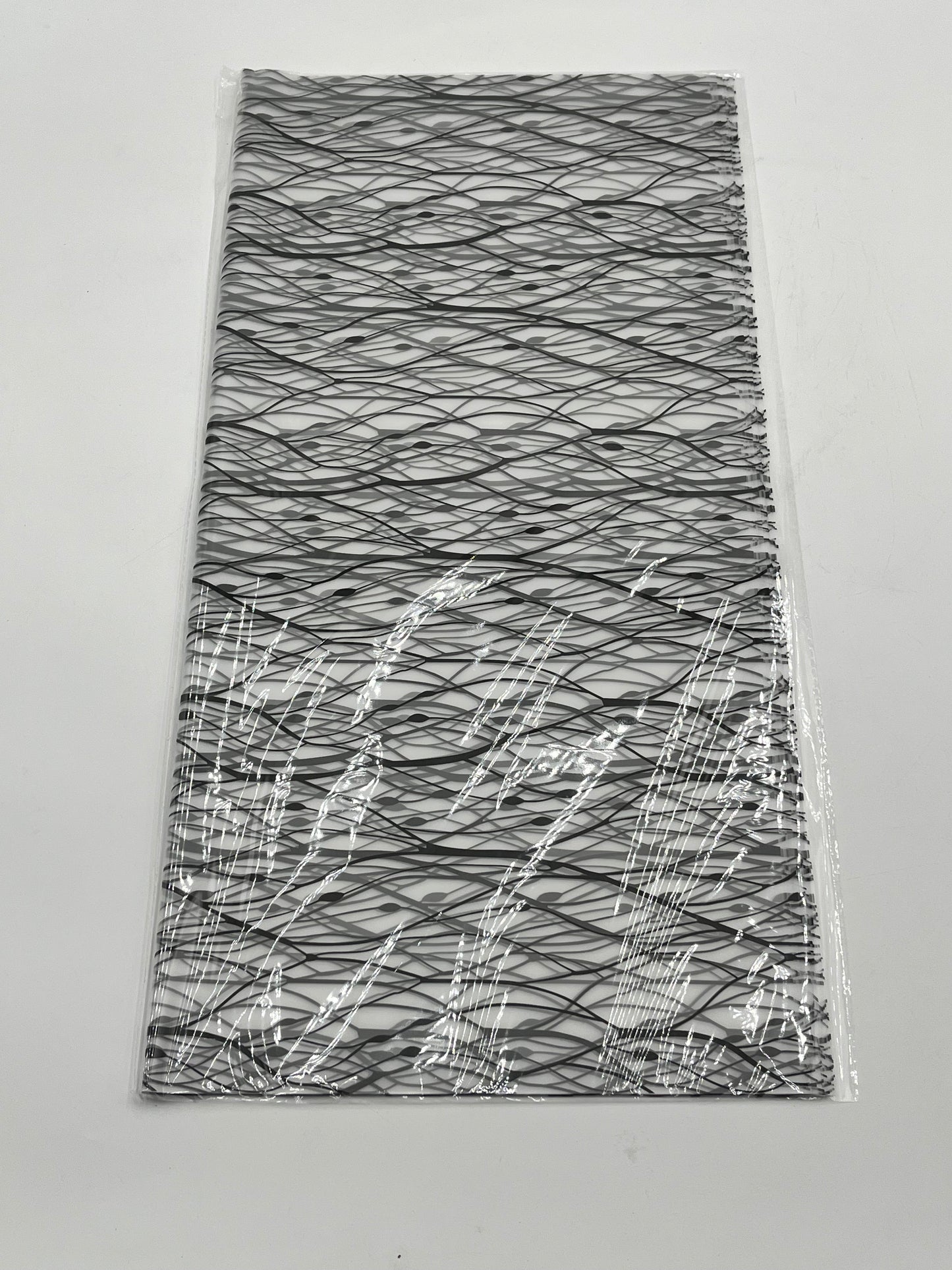 Gossamer Luxe Set– 22x22” web-pattern floral wrapping sheets in Black. Elegant, modern & sold in packs of 20 for $9.99 by floralsuppliespoint1.com