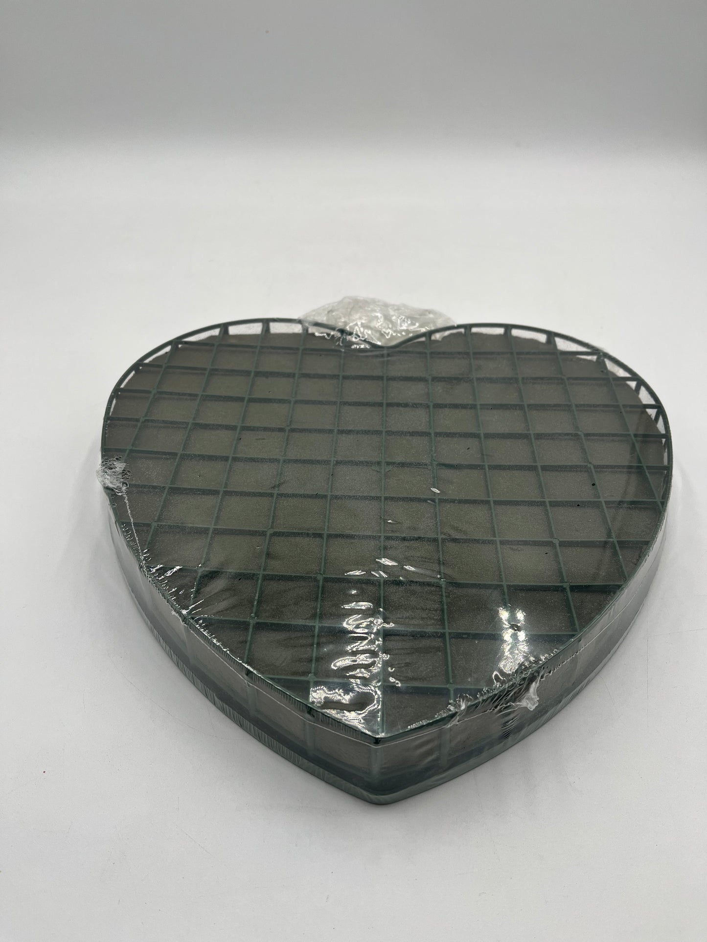 Heart-shaped floral foam wreath bases, 8" & 12", keep flowers fresh with water-absorbing foam & sturdy backing. Sold by floralsuppliespoint1.com.