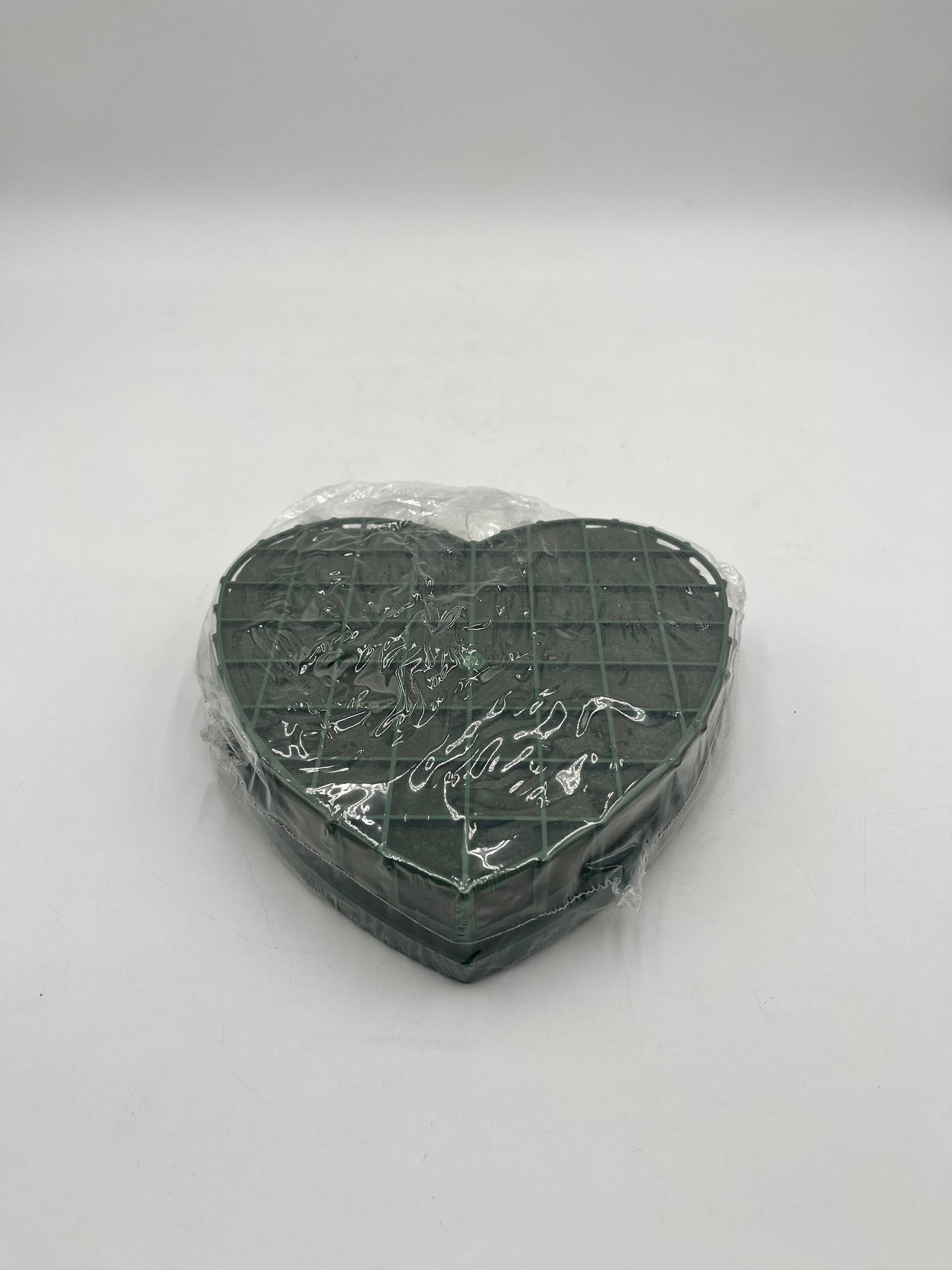 Heart-shaped floral foam wreath bases, 8" & 12", keep flowers fresh with water-absorbing foam & sturdy backing. Sold by floralsuppliespoint1.com.