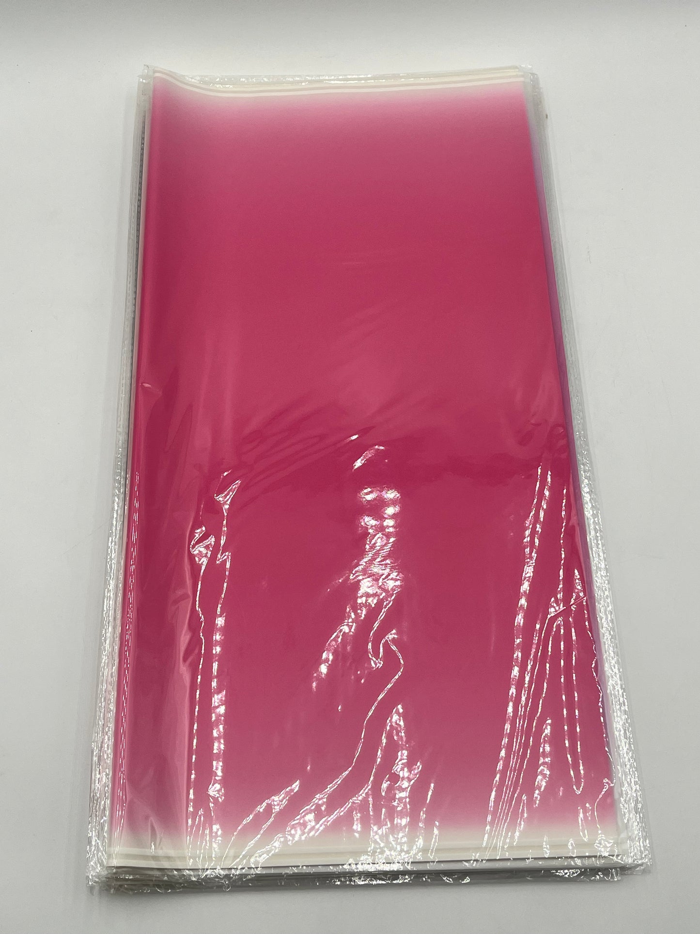 Gradient wrapping sheets for floral bouquets, gift packaging & DIY gifting in Hot Pink, 20x20 inches & available at floralsuppliespoint1.com for $9.99