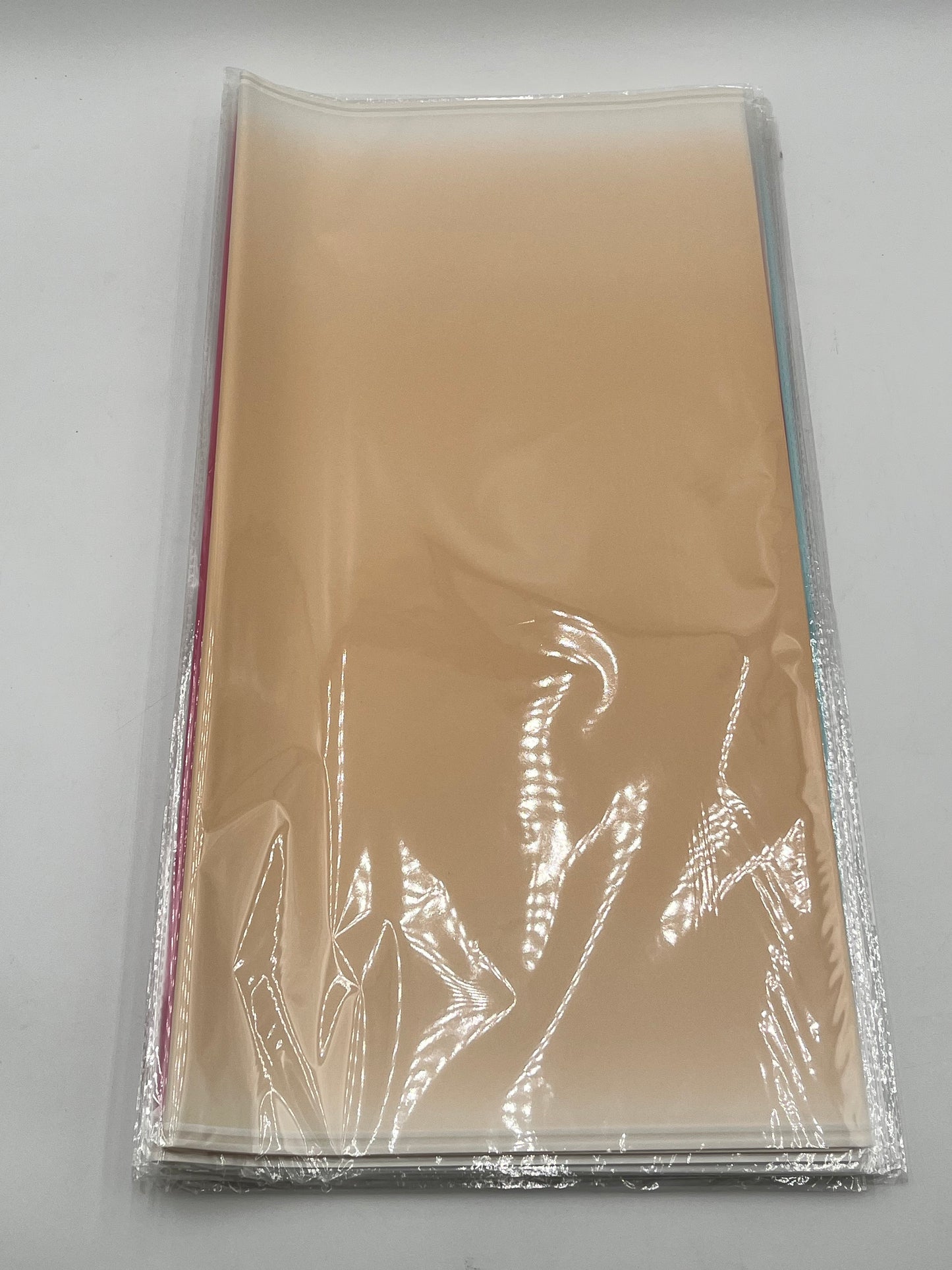 Gradient wrapping sheets for floral bouquets, gift packaging & DIY gifting in Peach, 20x20 inches & available at floralsuppliespoint1.com for $9.99