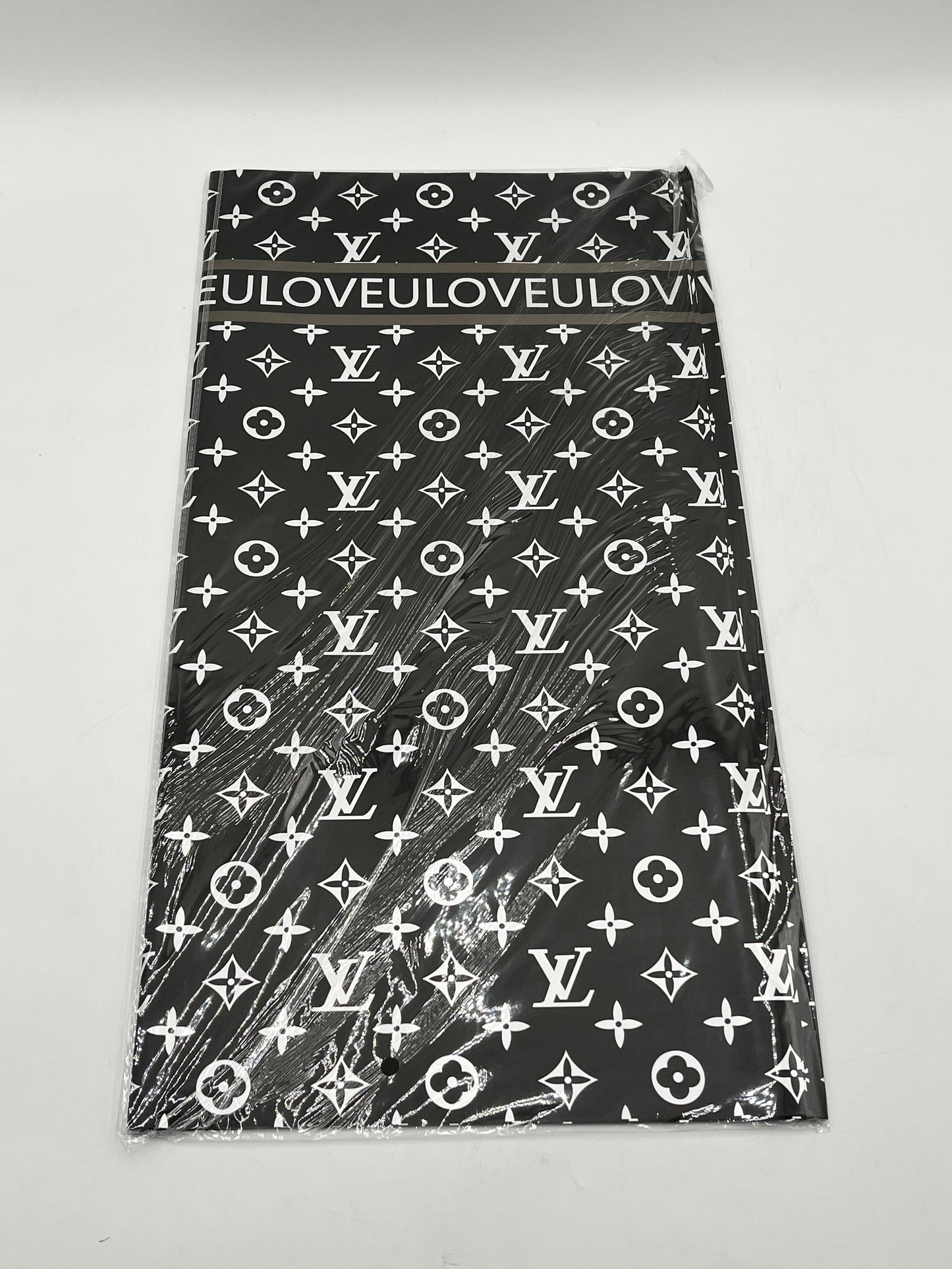 LOVEU LV Luxe Set wrapping paper in Black with iconic LV monogram. 20 sheets of 22"x22", Sold by floralsuppliespoint1.com for $9.99