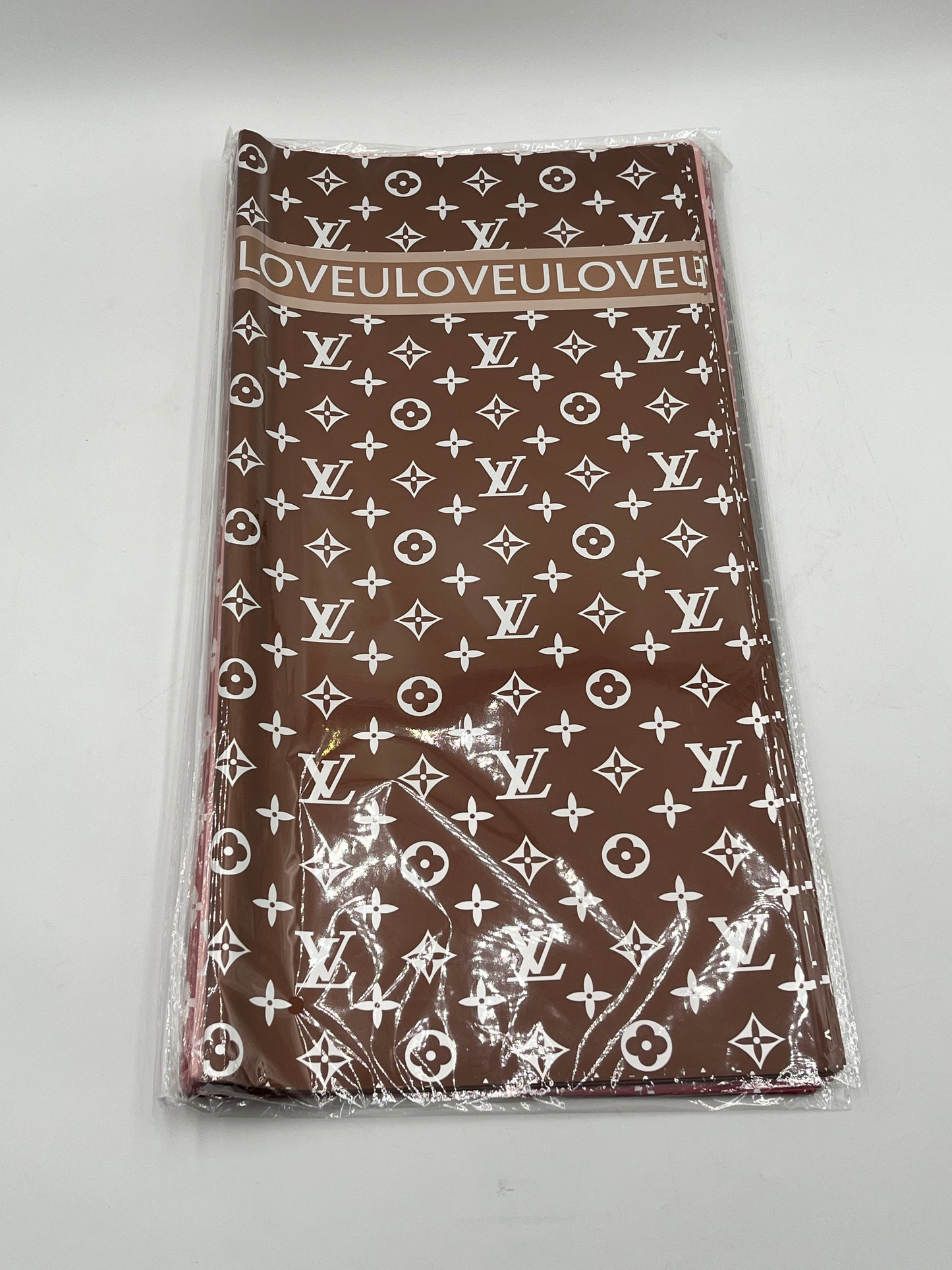 LOVEU LV Luxe Set wrapping paper in Brown with iconic LV monogram. 20 sheets of 22"x22", Sold by floralsuppliespoint1.com for $9.99