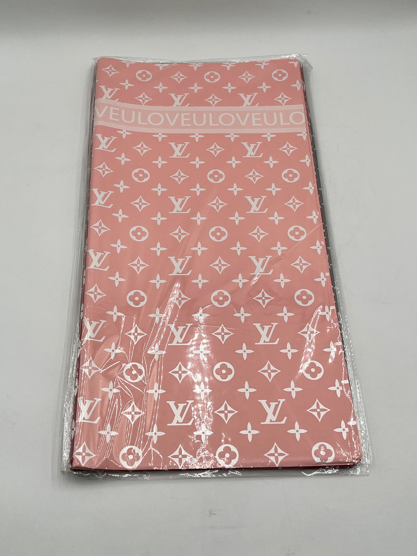 LOVEU LV Luxe Set wrapping paper in Peach with iconic LV monogram. 20 sheets of 22"x22", Sold by floralsuppliespoint1.com for $9.99