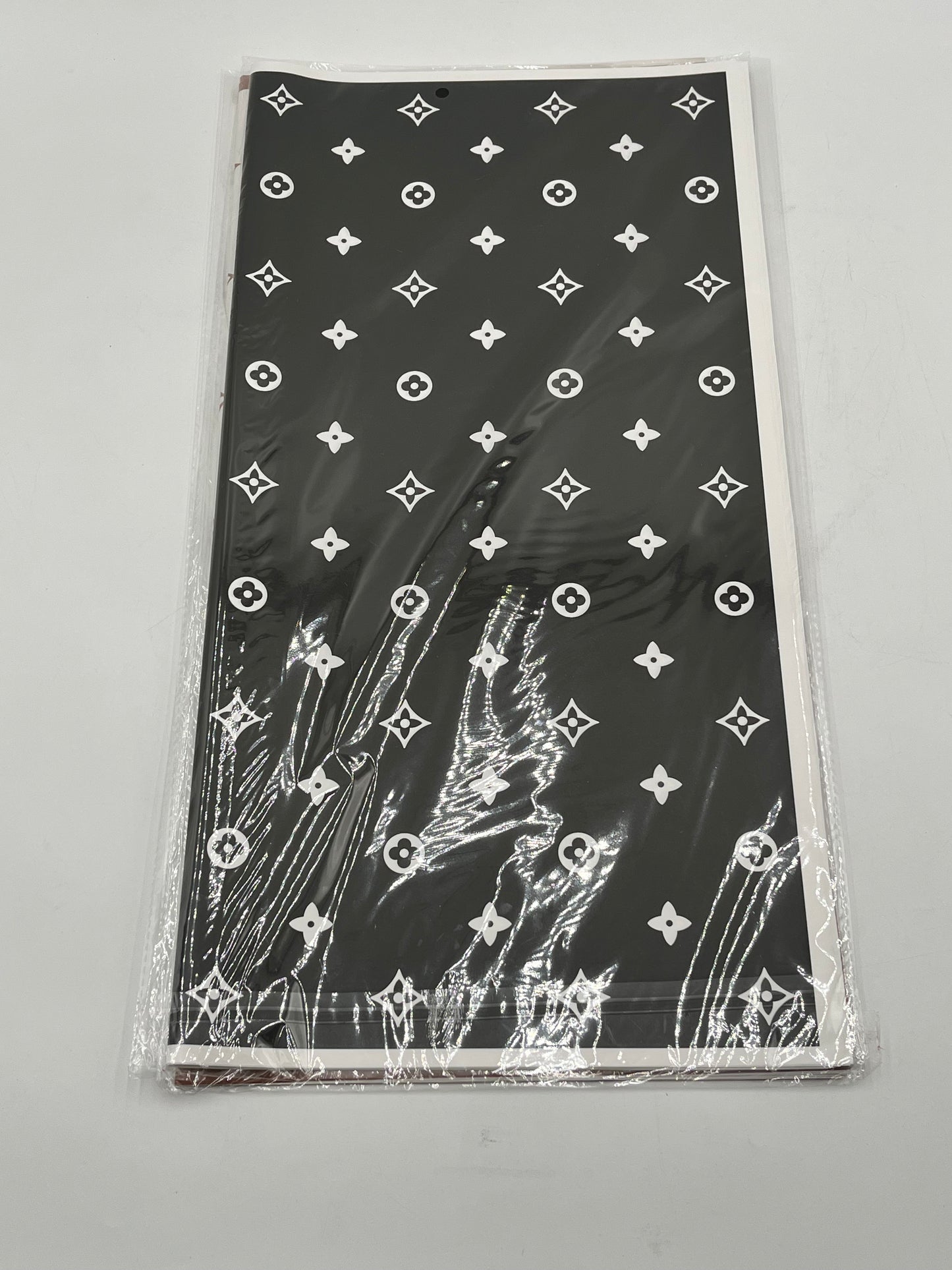 LV Luxe Monogram Edition wrapping sheets in Black, 22x22" (20 sheets) for floral & gift use. Sold by floralsuppliespoint1.com for $9.99