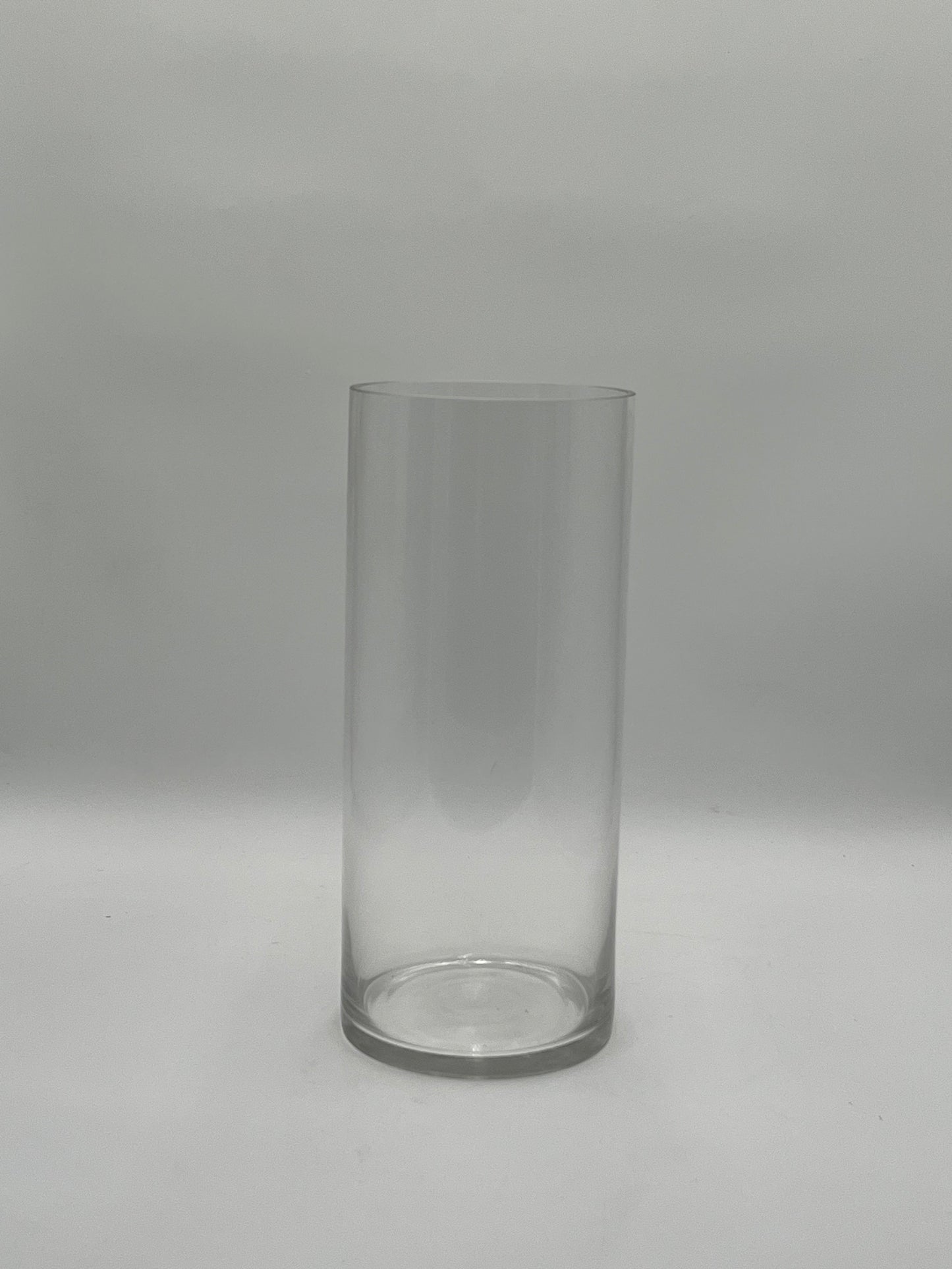 The LuxeGlass Cylinder Collection are clear glass cylinder vases in four sizes, ideal for floral designs, candles, or events. Sturdy, elegant, and sold individually by floralsuppliespoint1.com.