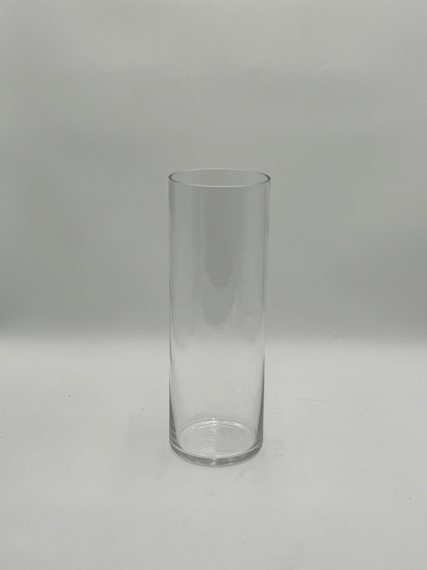 The LuxeGlass Cylinder Collection are clear glass cylinder vases in four sizes, ideal for floral designs, candles, or events. Sturdy, elegant, and sold individually by floralsuppliespoint1.com.
