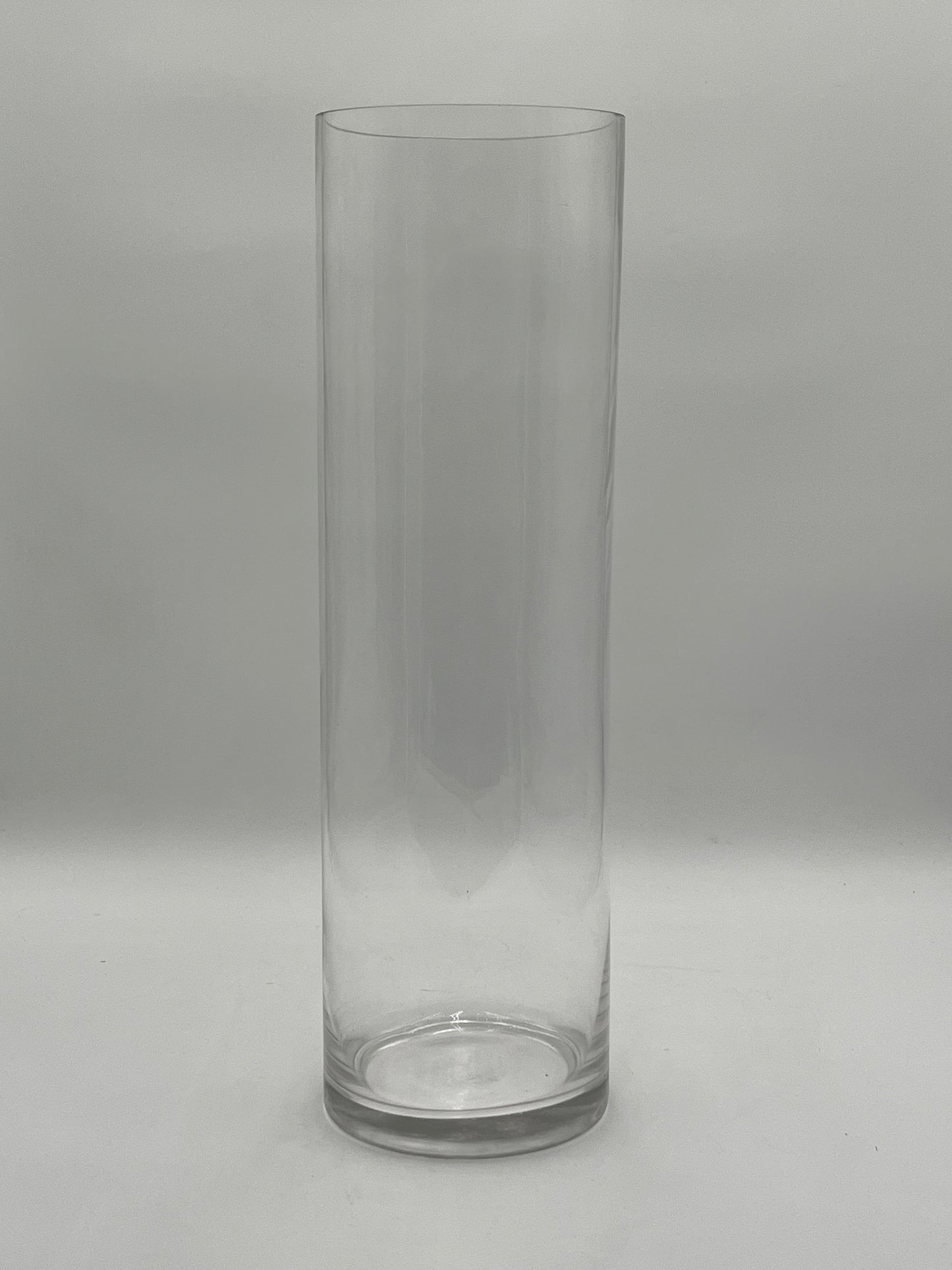 The LuxeGlass Cylinder Collection are clear glass cylinder vases in four sizes, ideal for floral designs, candles, or events. Sturdy, elegant, and sold individually by floralsuppliespoint1.com.
