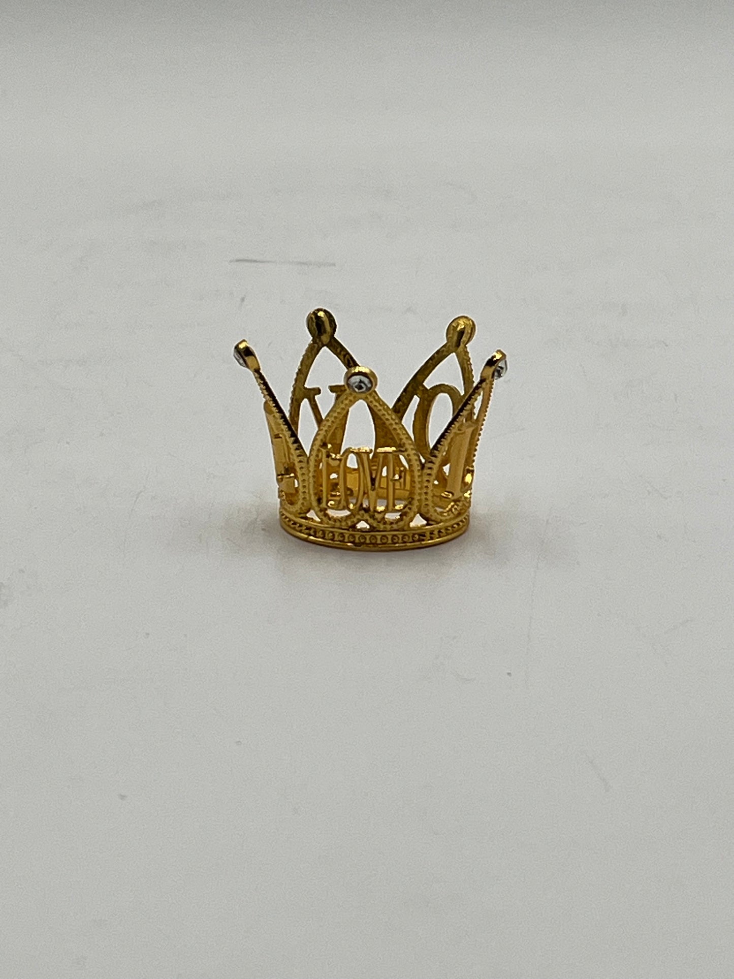 Mini gold crown for floral arrangements, cakes, and party favors. Perfect for weddings, showers & crafts. Sold individually or wholesale by floralsuppliespoint1.com