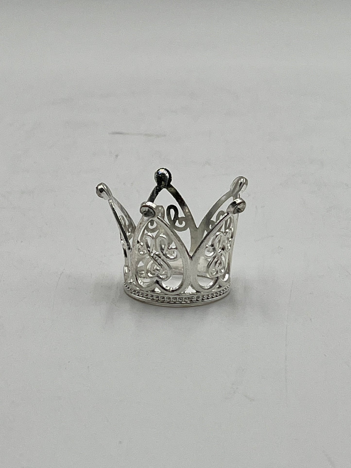 Mini silver crown for floral arrangements, cakes, and party favors. Perfect for weddings, showers & crafts. Sold individually or wholesale by floralsuppliespoint1.com