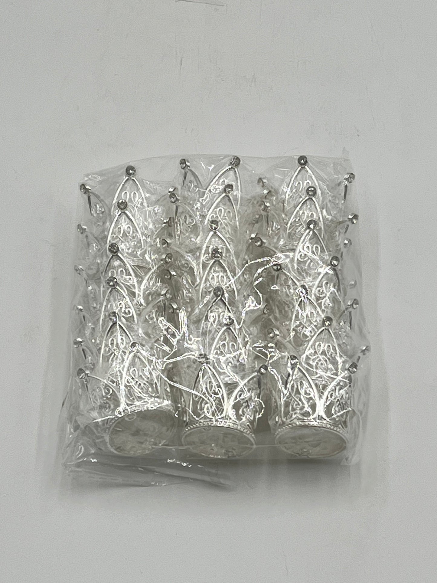 Mini silver crowns 20 pack for floral arrangements, cakes, and party favors. Perfect for weddings, showers & crafts. Sold individually or wholesale by floralsuppliespoint1.com
