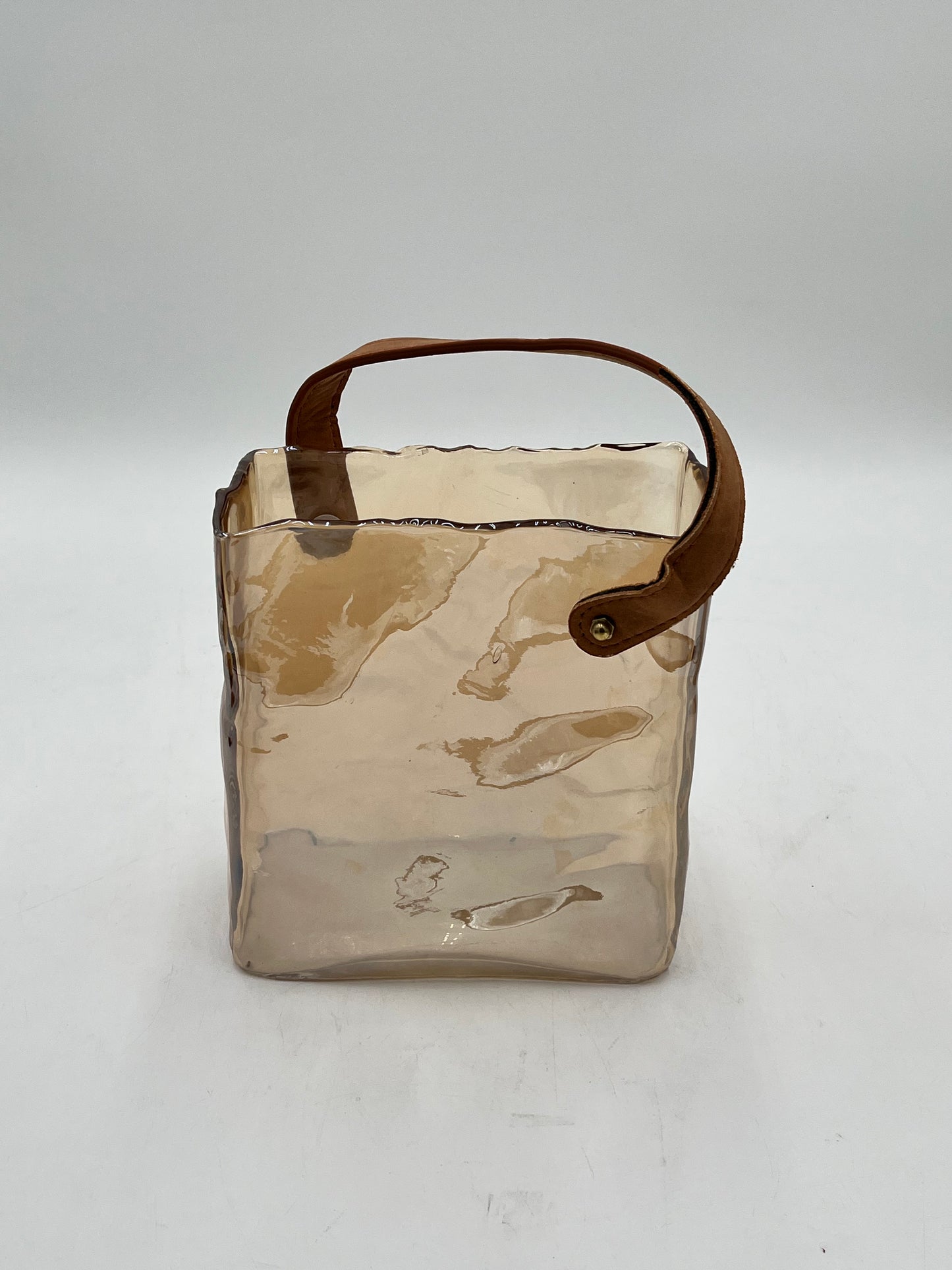 Nomad Tote glass vase with suede handles in champagne beige, medium size. Modern décor sold by floralsuppliespoint1.com
