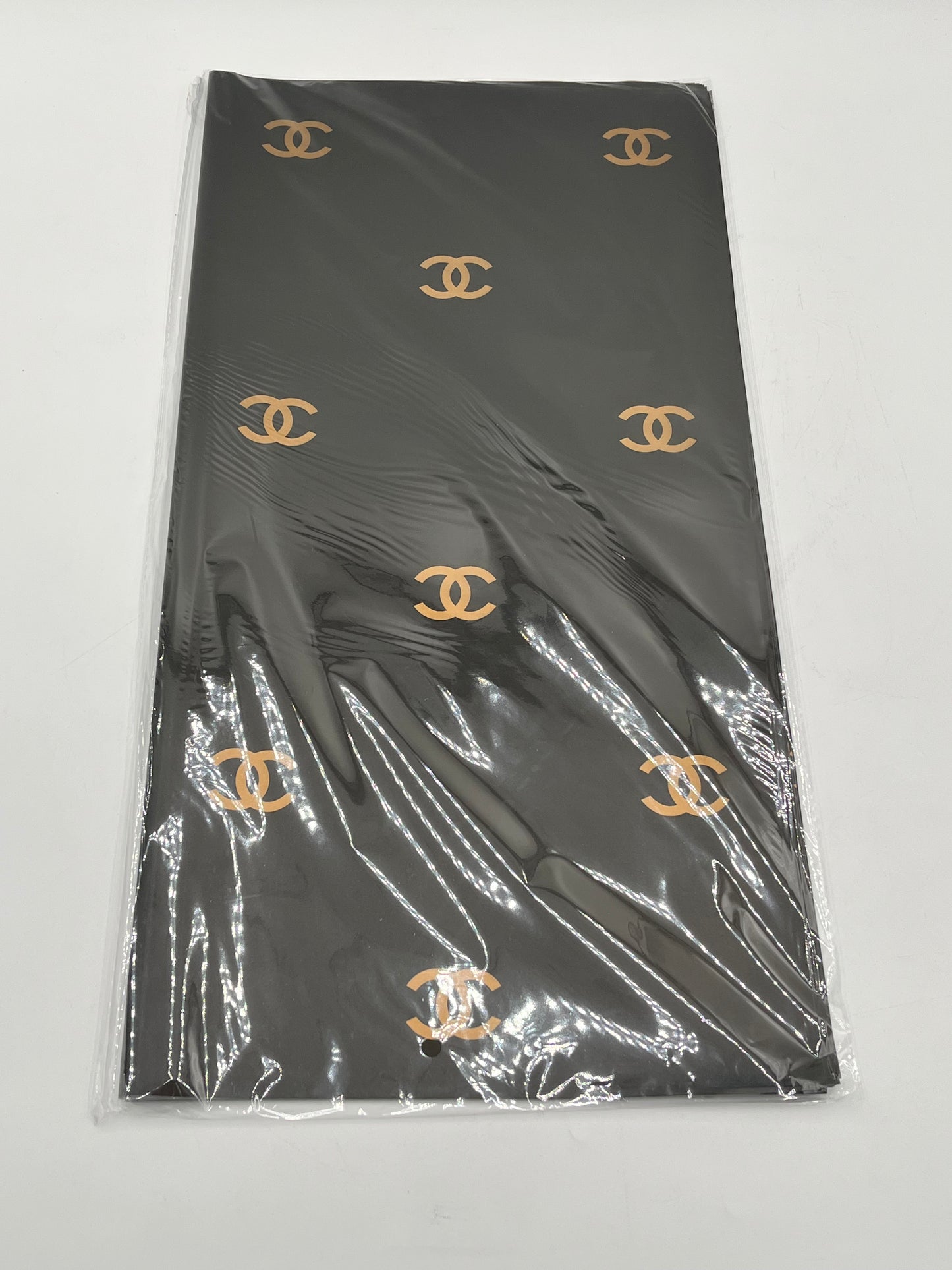 Paris Luxe CC Collection– in black, designer-inspired wrapping papers with gold & black logos. 20 sheet pack for $9.99 each by floralsuppliespoint1.com