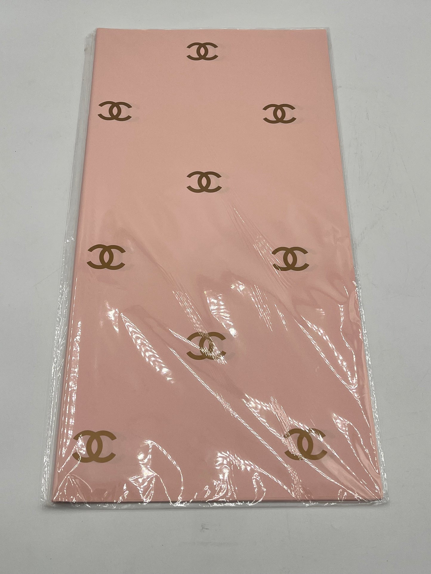Paris Luxe CC Collection– in peach, designer-inspired wrapping papers with gold & black logos. 20 sheet pack for $9.99 each by floralsuppliespoint1.com