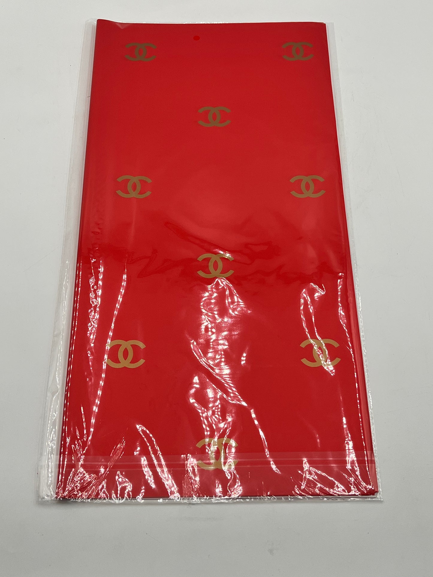 Paris Luxe CC Collection– in red, designer-inspired wrapping papers with gold & black logos. 20 sheet pack for $9.99 each by floralsuppliespoint1.com