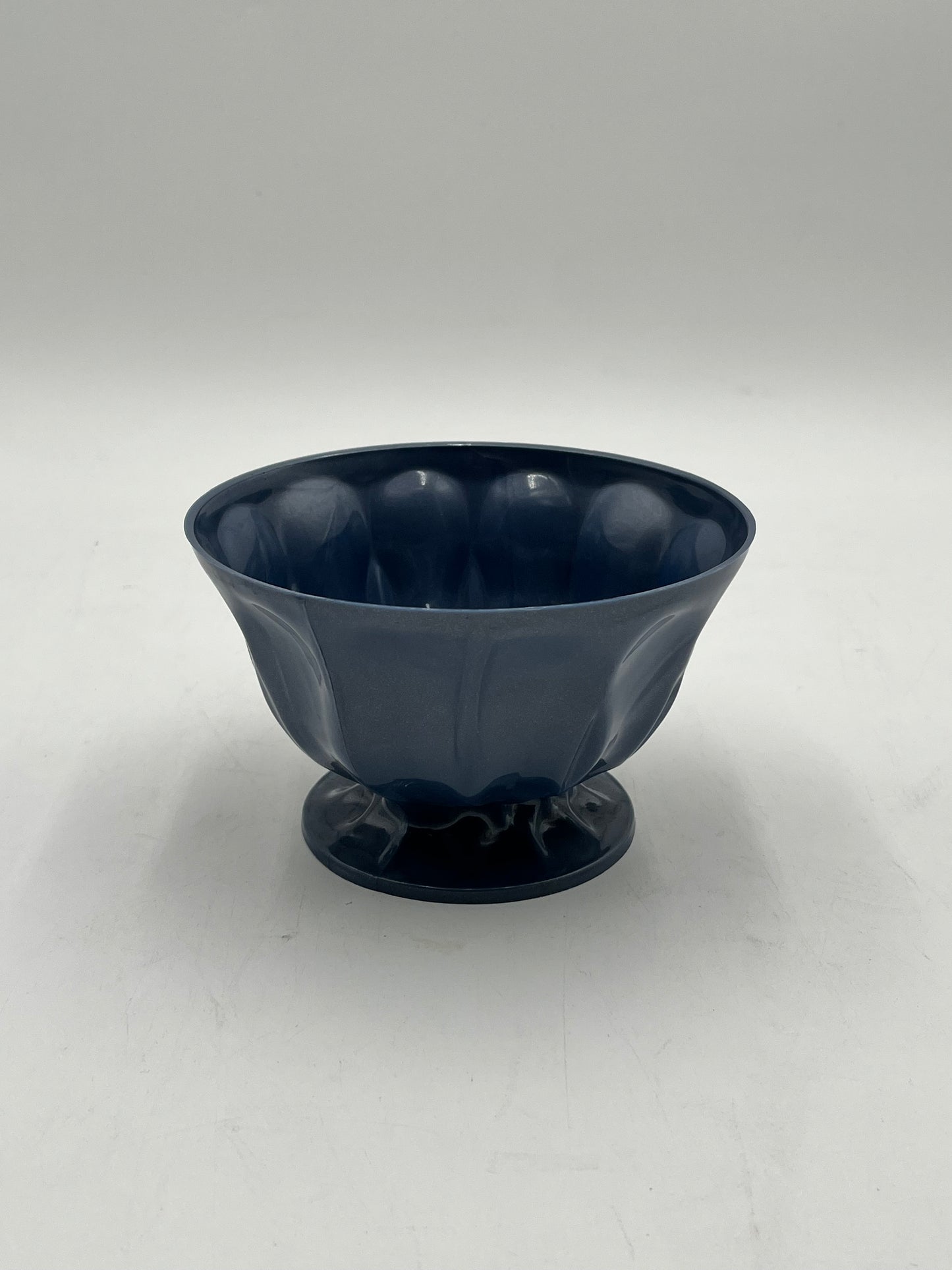 A pastel pedestal bowl in blue. Perfect 4x6 floral base for décor or sympathy tributes. Available @ floralsuppliespoint1.com for $5.99 each