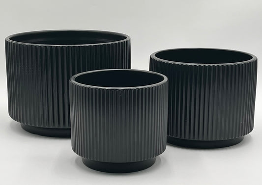 Ridge Nest Set of 3 ribbed ceramic vases in black with sizes 5.75x5.75", 6.25x7", and 7.25x9" (height x opening), total 11.80 lbs, available in black or white at floralsuppliespoint1.com.