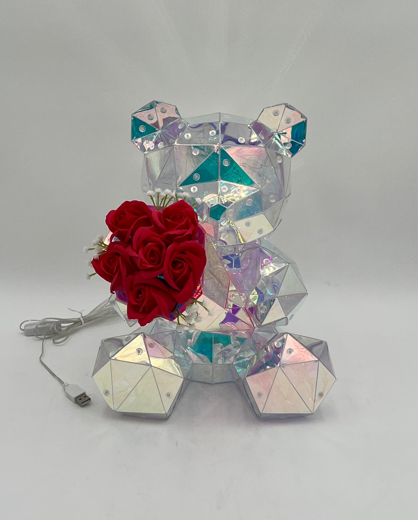 Iridescent light-up Rose Crystal Bear with red roses, USB cable, and pink gift box. Sold by floralsuppliespoint1.com for Individual $34.99 retail or $160 wholesale for 8-count case.