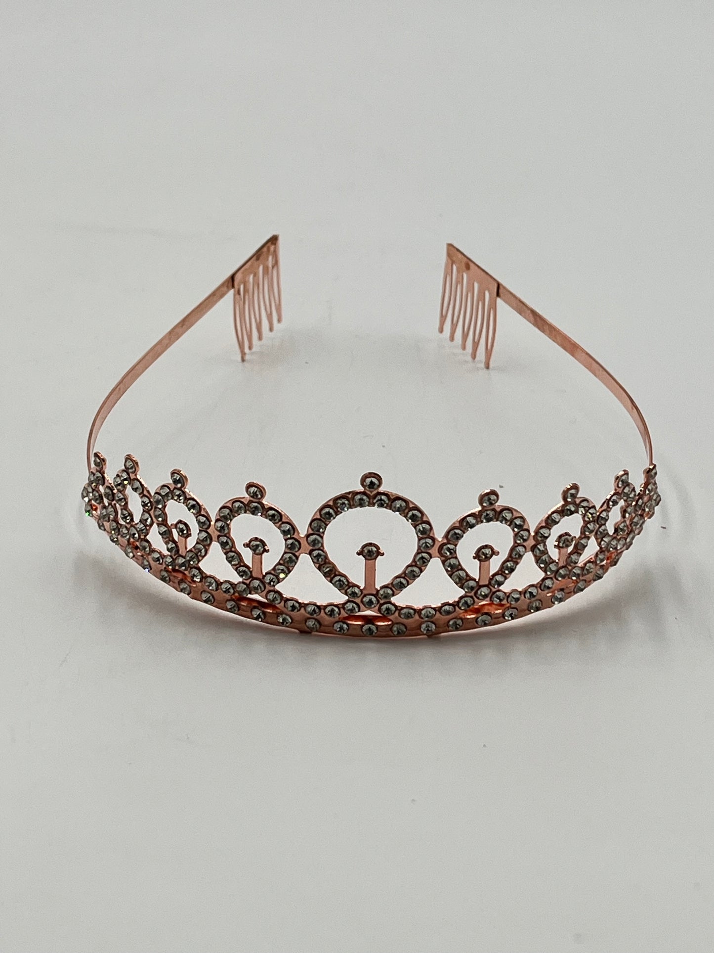 Royal Crystal Tiara Headband in gold, rose gold, and silver, sold retail & wholesale by floralsuppliespoint1.com. Ideal for birthdays & celebrations.
