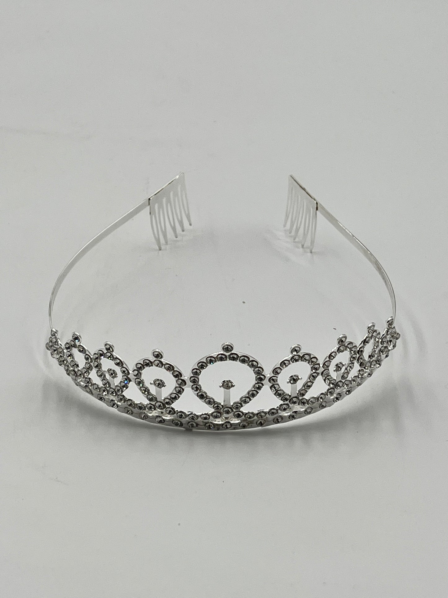 Royal Crystal Tiara Headband in gold, rose gold, and silver, sold retail & wholesale by floralsuppliespoint1.com. Ideal for birthdays & celebrations.