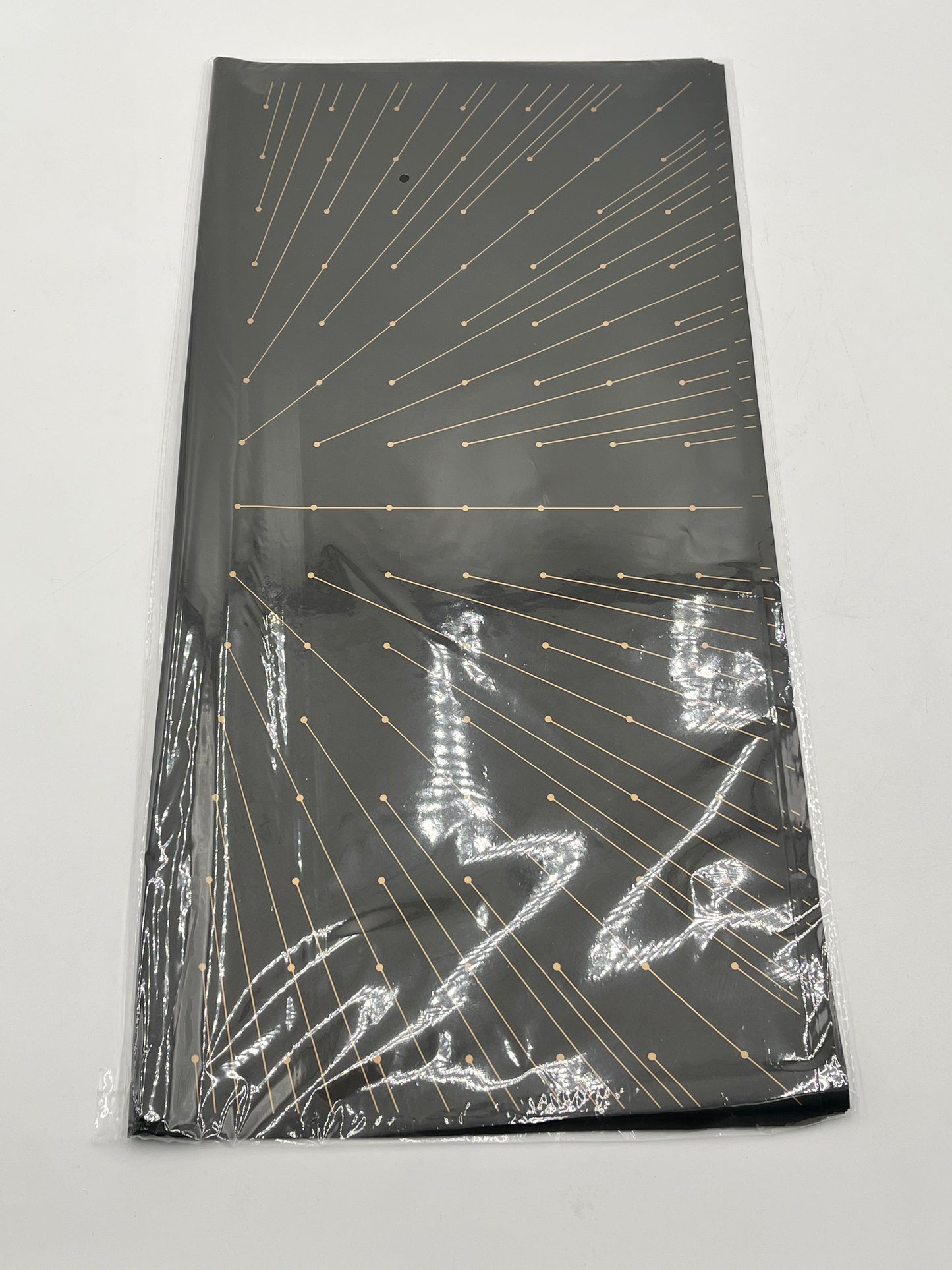 Starlight Burst floral wrapping paper with gold burst accents, available in Black, 22x22", 20 per pack for $9.99. Available @ floralsuppliespoint1.com