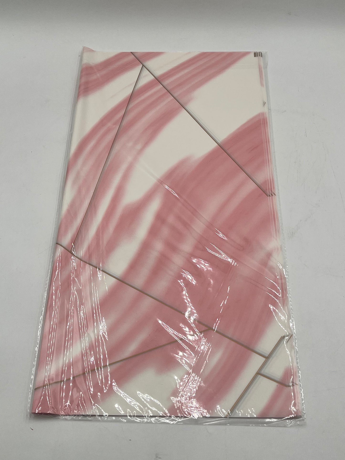 Wrapping sheets in Pink marble swirl designs, 22x22 inch (20 sheets). Sold by floralsuppliespoint1.com for $9.99