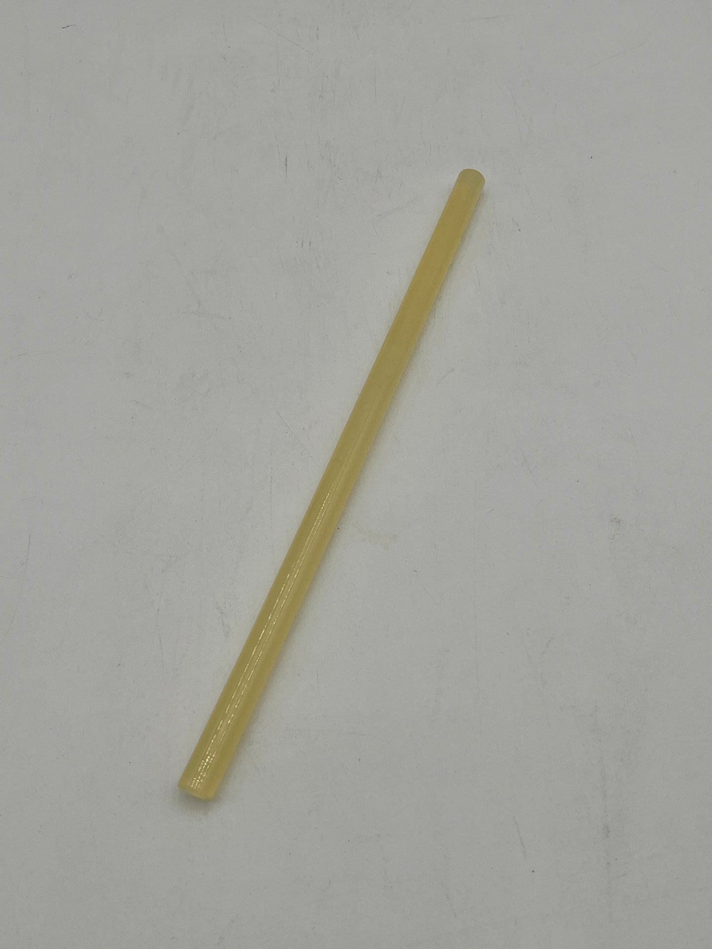 A yellow hot glue gun sticks for floral arrangements, crafts and DIY projects. Sold by floralsuppliespoint1.com