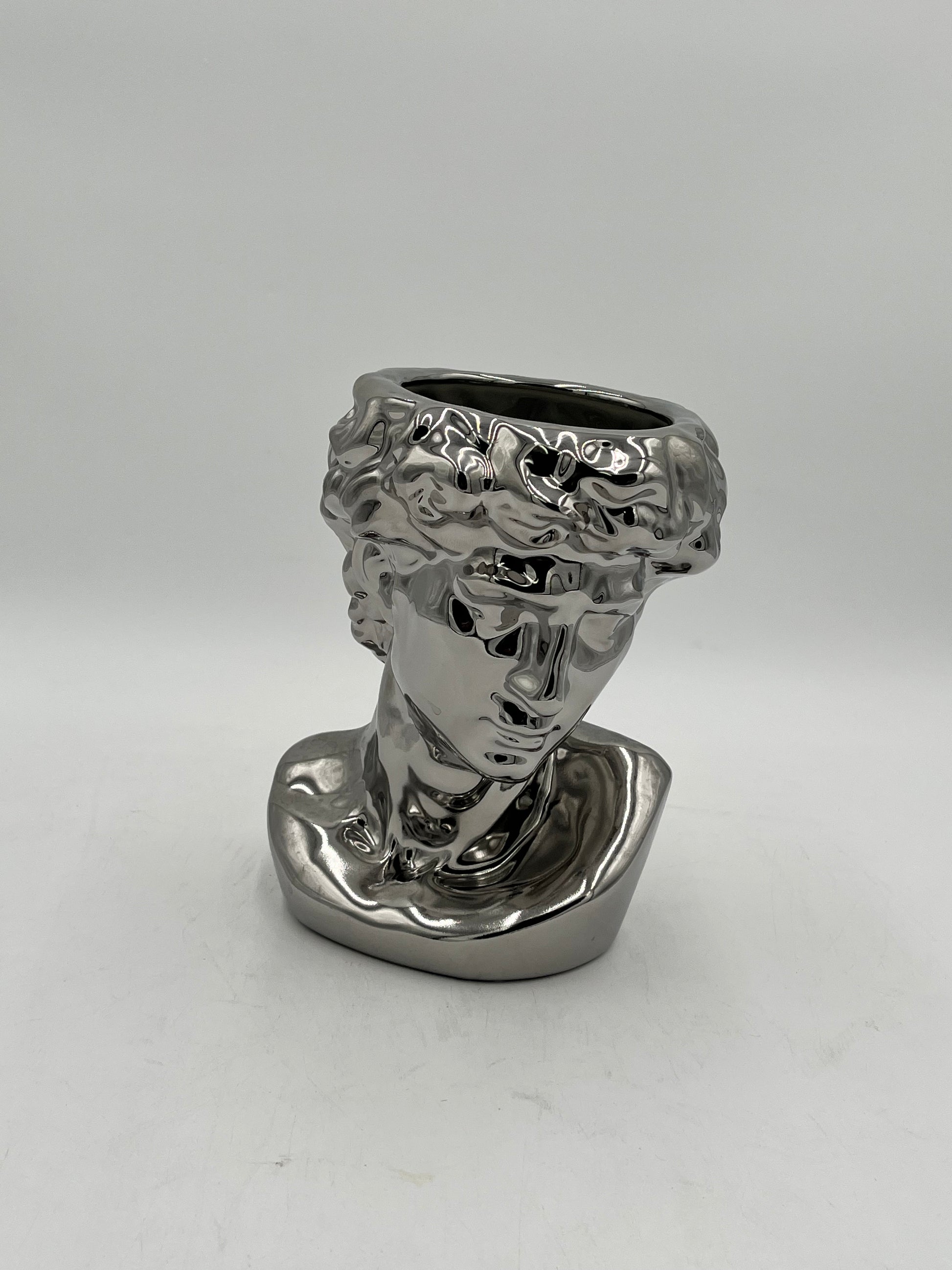 Silver ceramic bust vase with reflective finish, titled Apollo Gaze — modern artistic décor sold by floralsuppliespoint1.com $14.99