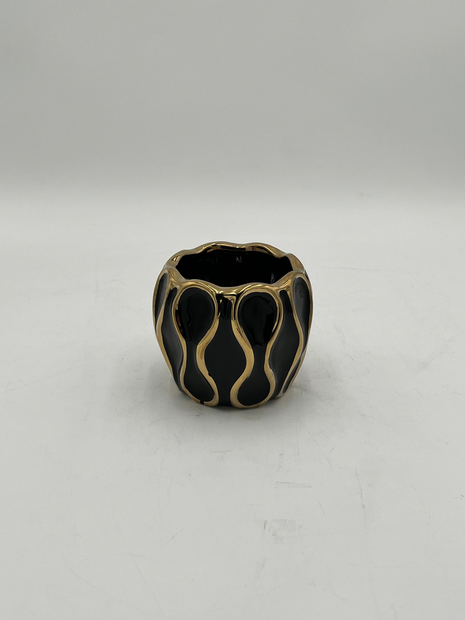 Auric Wave ceramic vases in black & white with gold wave detailing. Elegant décor accent pieces available in 5 sizes & sold by floralsuppliespoint1.com.