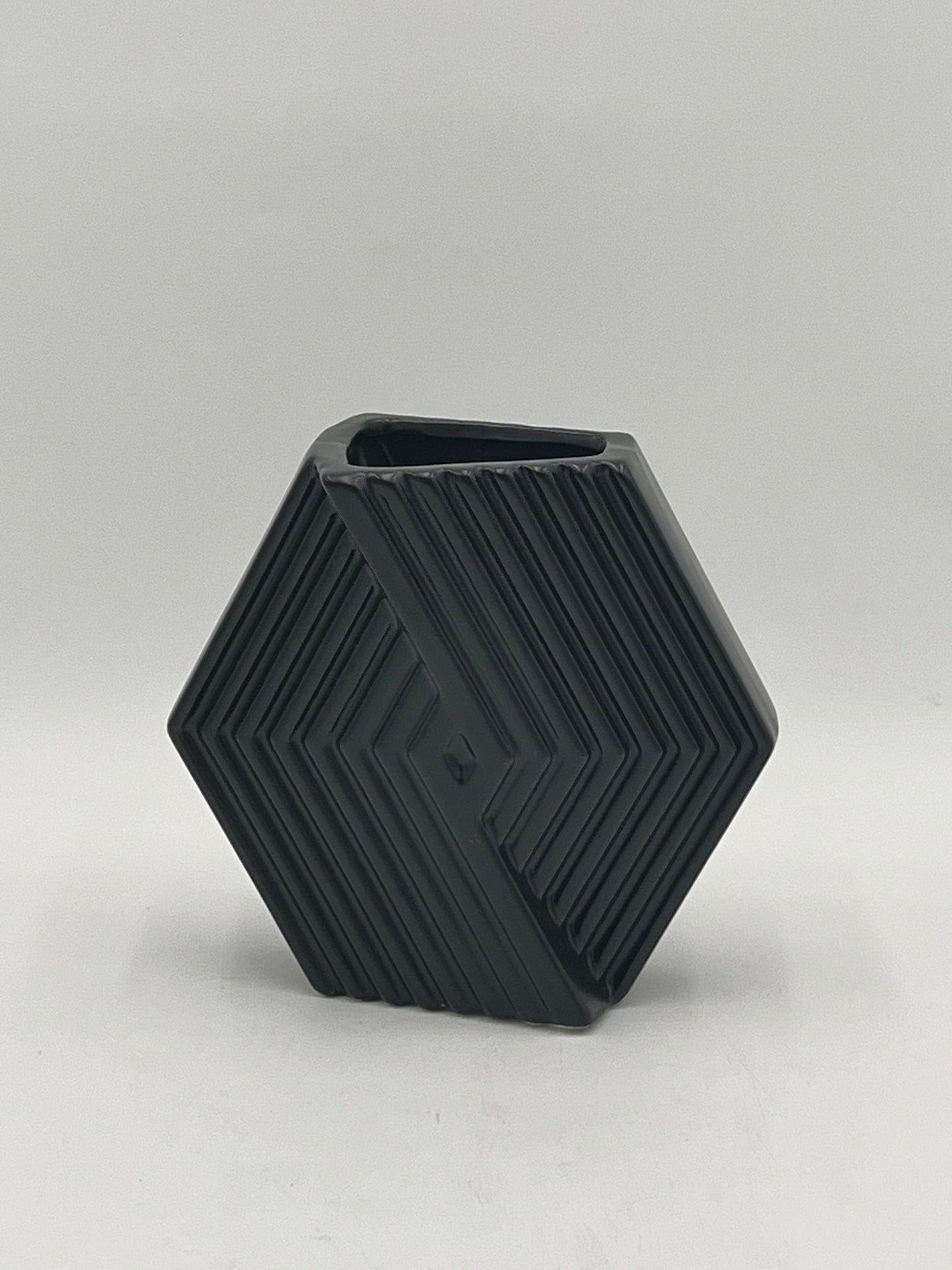 Chevron Crest Mini ceramic vases in matte black with geometric texture, sold by floralsuppliespoint1.com for modern floral arrangements or decor.