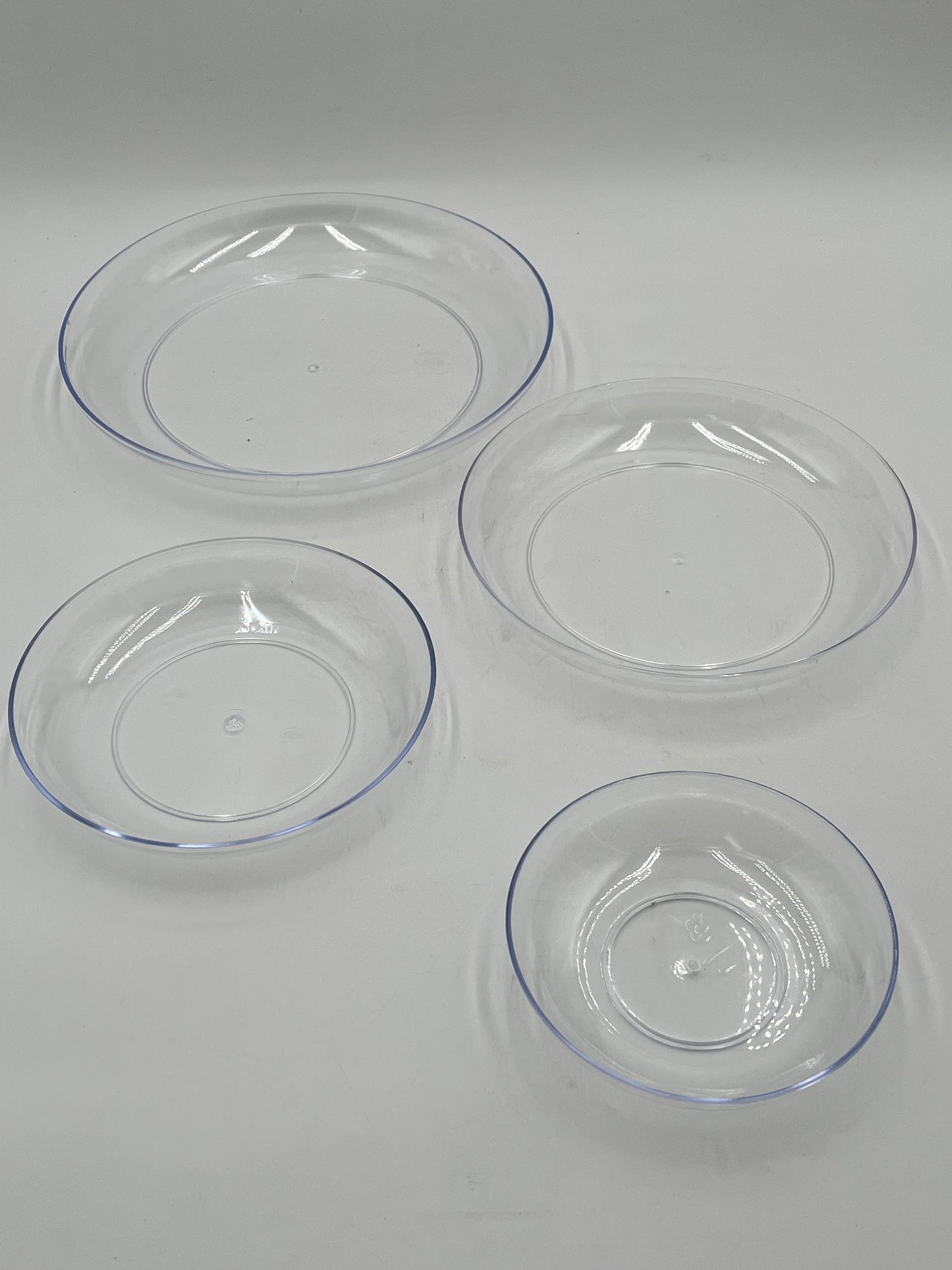 Clearview Floral Bases in 6, 7.5, 9 & 11"s. Transparent, durable & reusable trays for floral designs, available in retail & wholesale @ floralsuppliespoint1.com