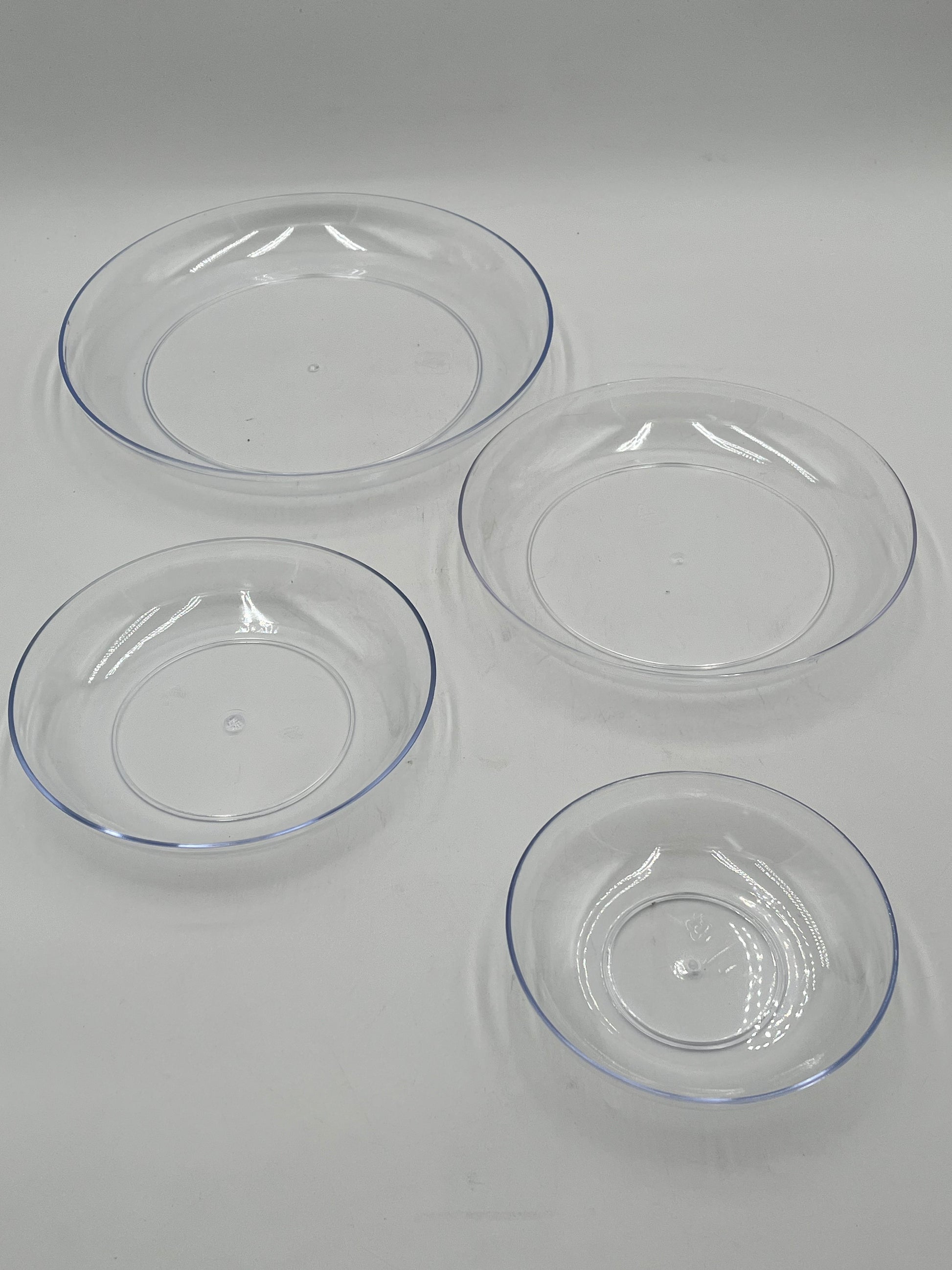 Clearview Floral Bases in 6, 7.5, 9 & 11"s. Transparent, durable & reusable trays for floral designs, available in retail & wholesale @ floralsuppliespoint1.com