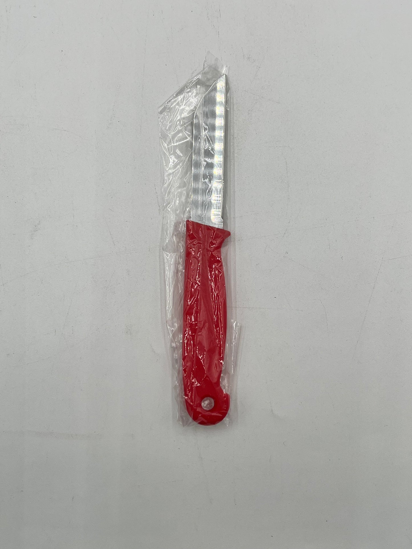 Craft & Floral Knife with red handle, sold individually for $ .99, in packs of 10 or boxes by floralsuppliespoint1.com.