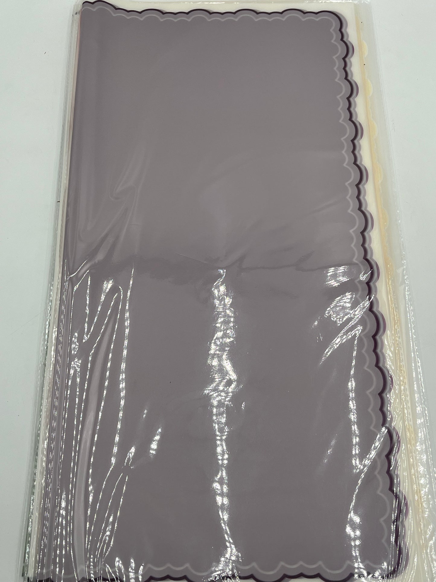 Lavender elegant scalloped wrapping paper, 22 in x 22 in, packs of 20 for $9.99. Perfect for flowers, gifts & crafts, sold by floralsuppliespoint1.com
