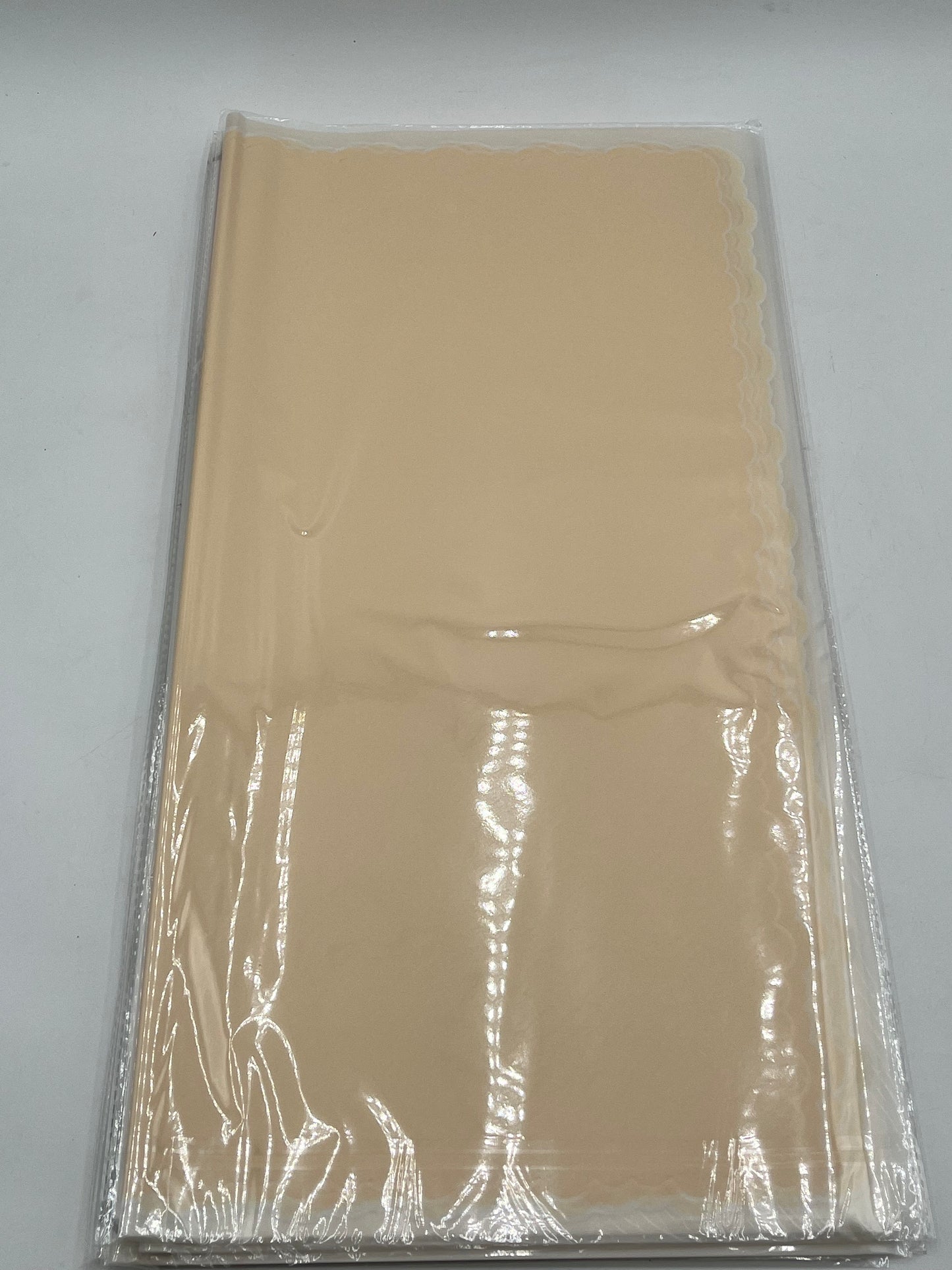 Soft yellow elegant scalloped wrapping paper, 22 in x 22 in, packs of 20 for $9.99. Perfect for flowers, gifts & crafts, sold by floralsuppliespoint1.com
