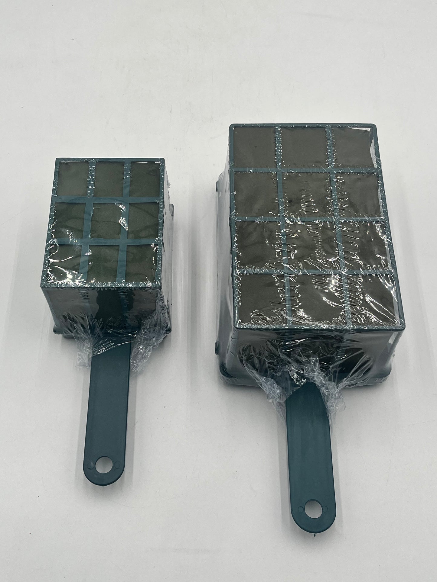 Floral foam cage holders with handles in small 4x3x3 & medium 7x5x3 sizes. Perfect for sturdy flower arrangements & displays. Sold by floralsuppliespoint1.com